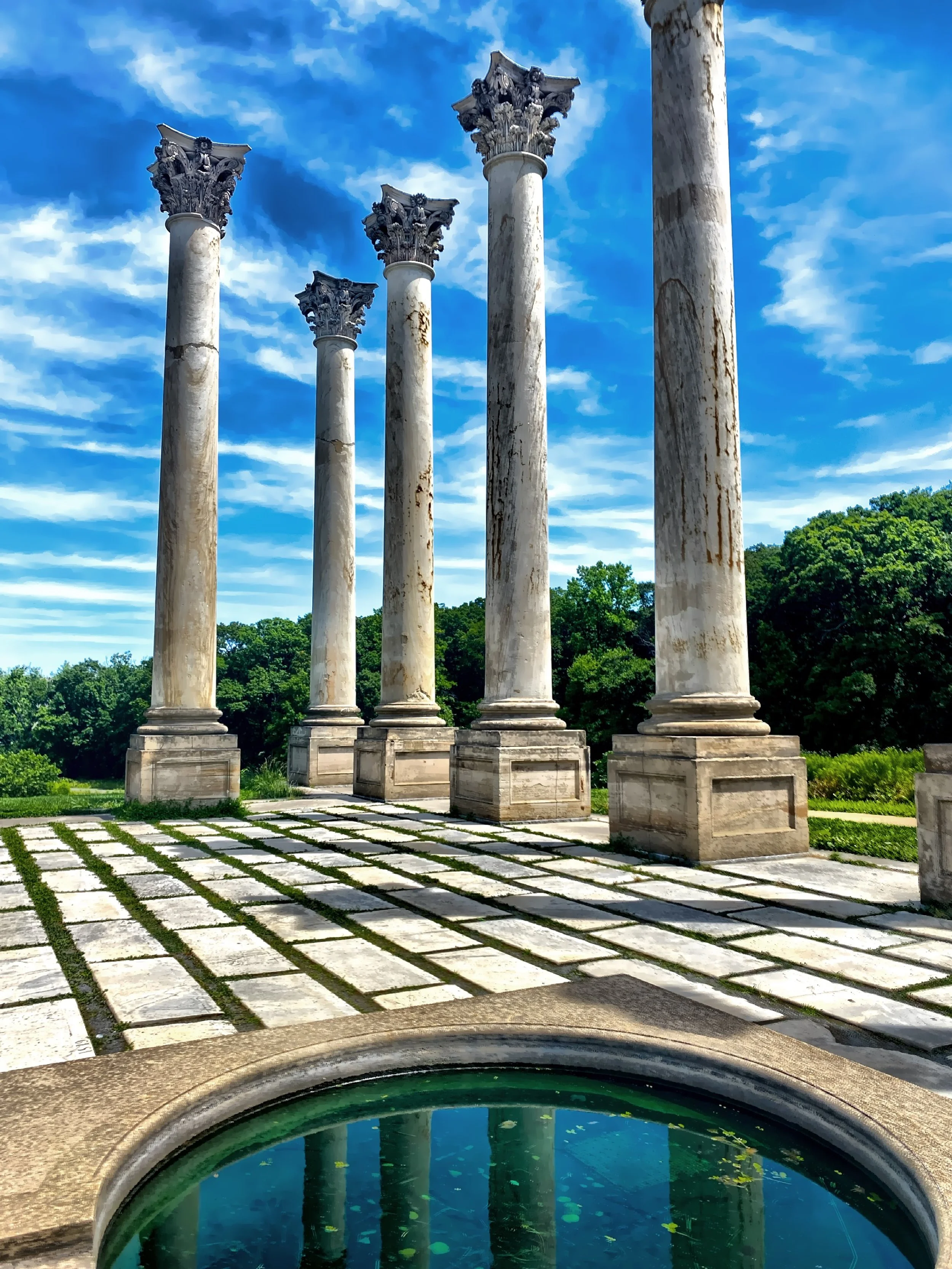  The National Capitol Columns are a monument in Washington, D.C.'s National Arboretum. It is an arrangement of twenty-two Corinthian columns which were a part of the United States Capitol from 1828 to 1958, placed amid 20 acres of open meadow, known 