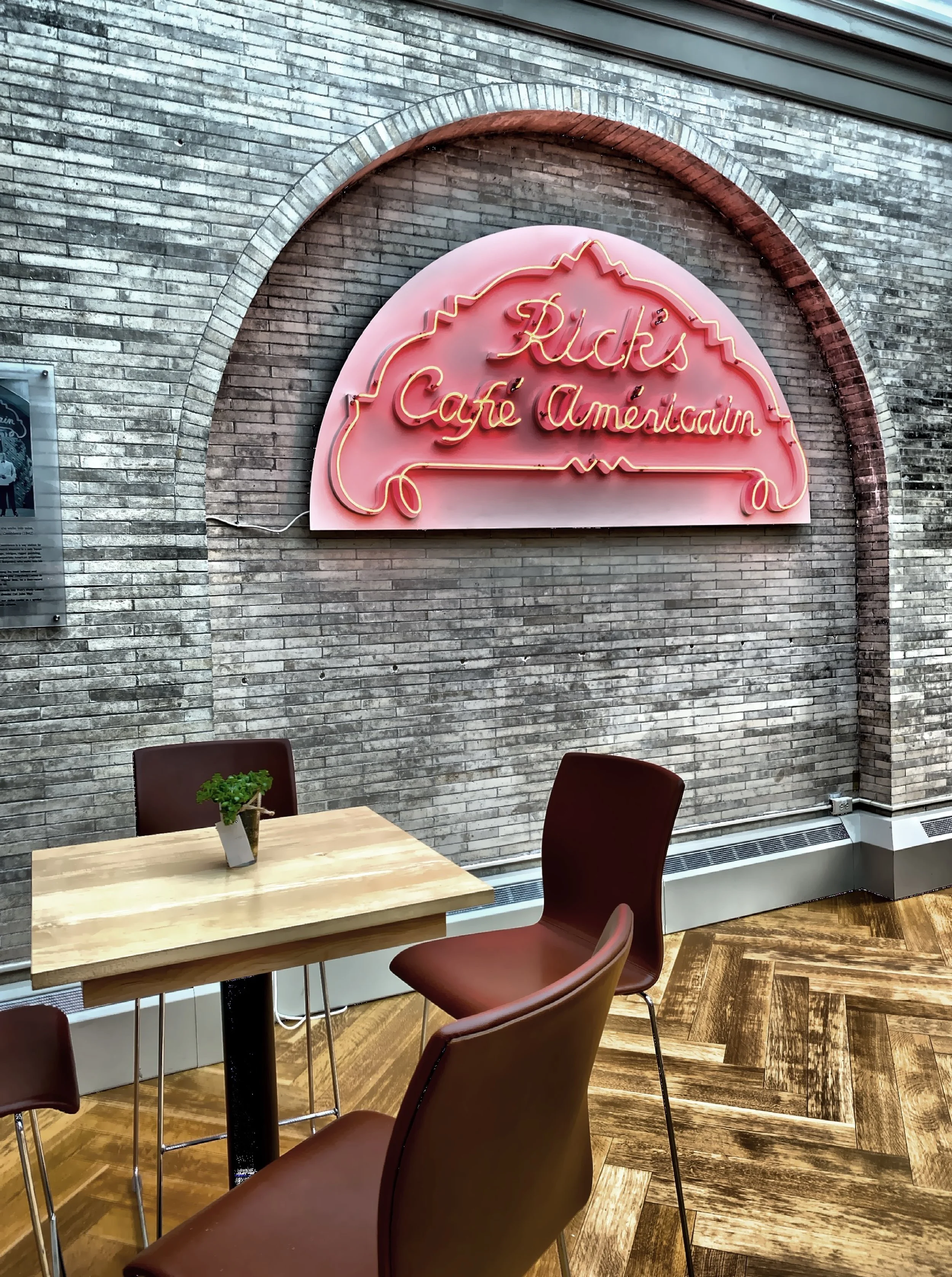  The replica of Rick's Cafe neon sign from Casablanca that hangs in the Palm House. 