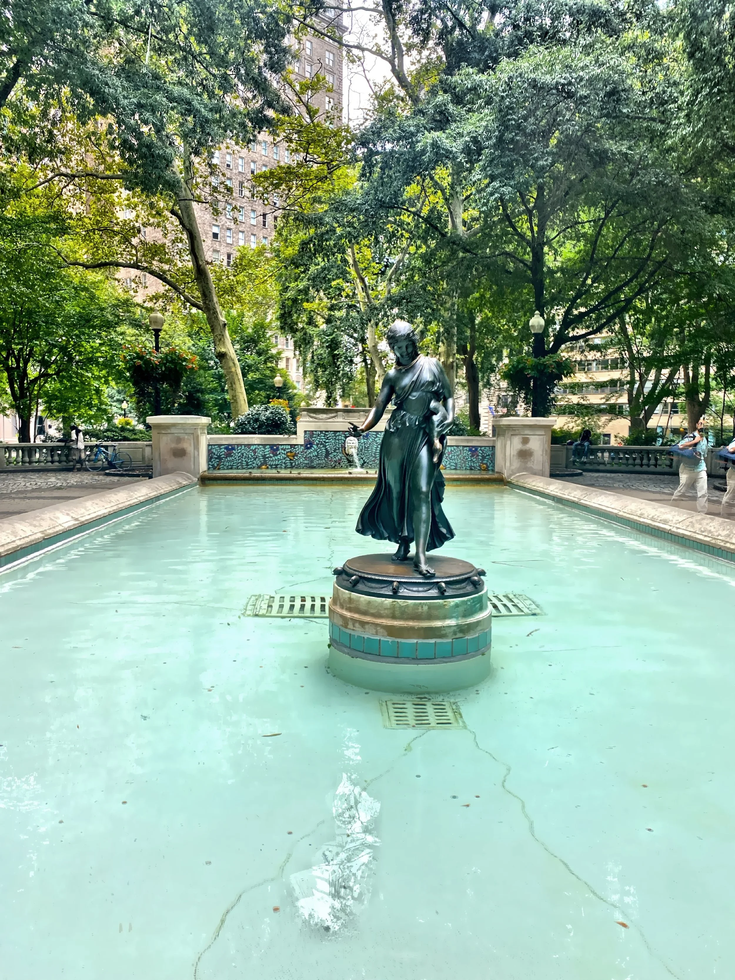  A fountain in Rittenhouse Square Park, a public park and is one of the five original open-space parks planned by William Penn and Thomas Holme during the late 17th century. 