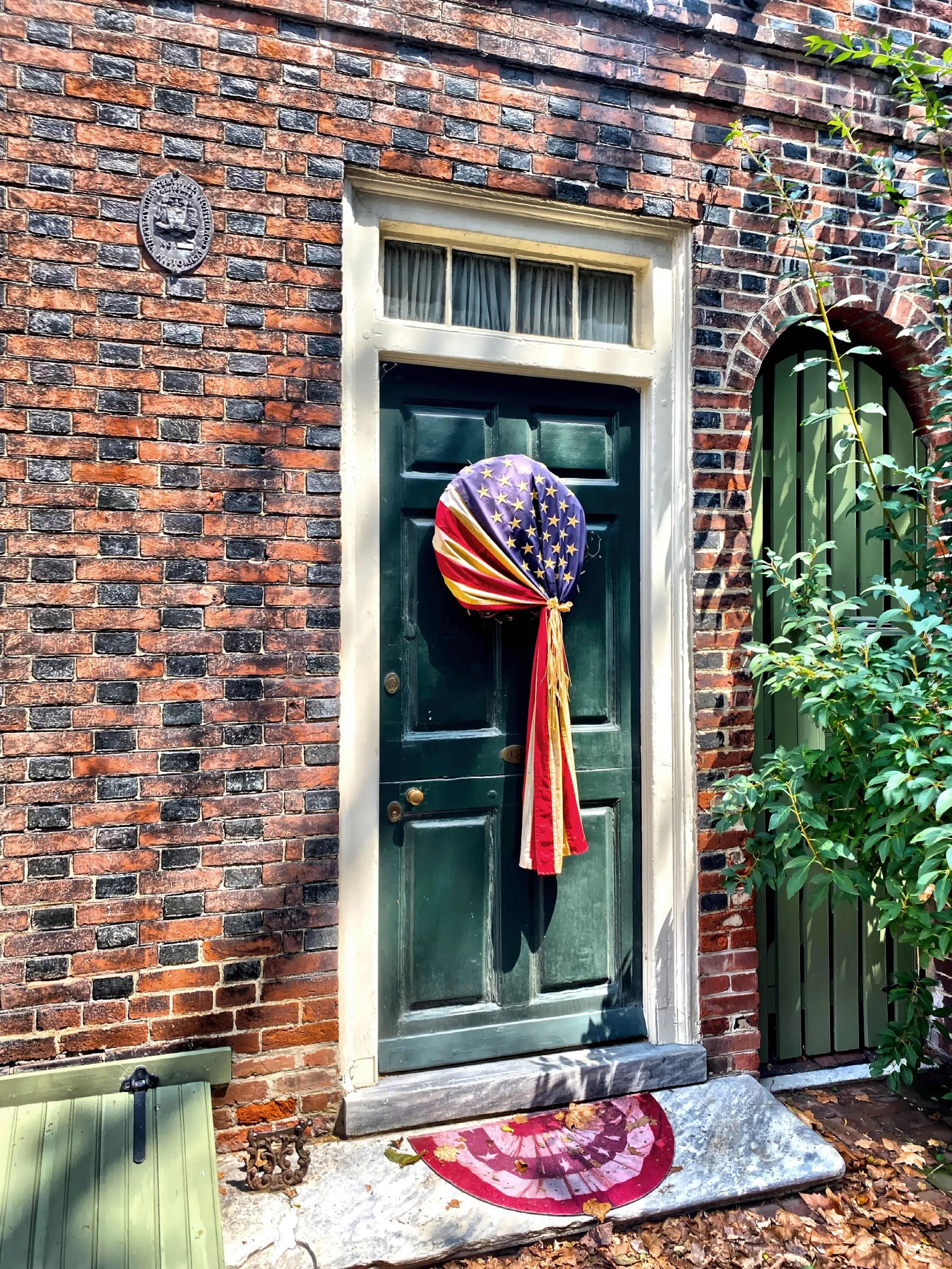  A decorated door on Elfreth's Alley, the United States' oldest continuously inhabited residential street. 
