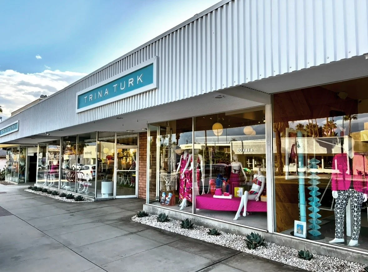 1960’s low-slung, glass-walled Albert Frey commercial building on Palm Canyon Drive. 