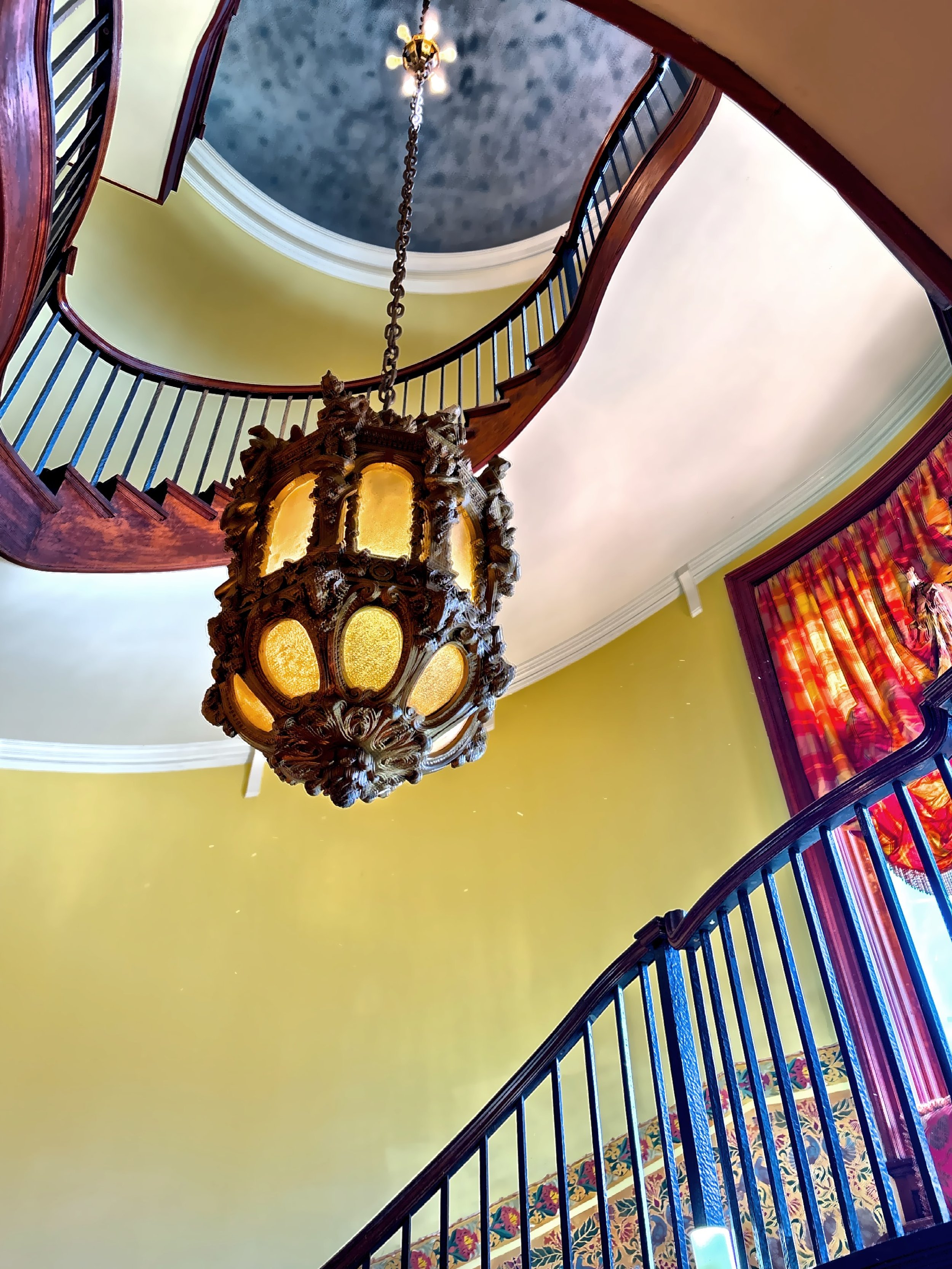  The stately circular stairway in the stair hall. 