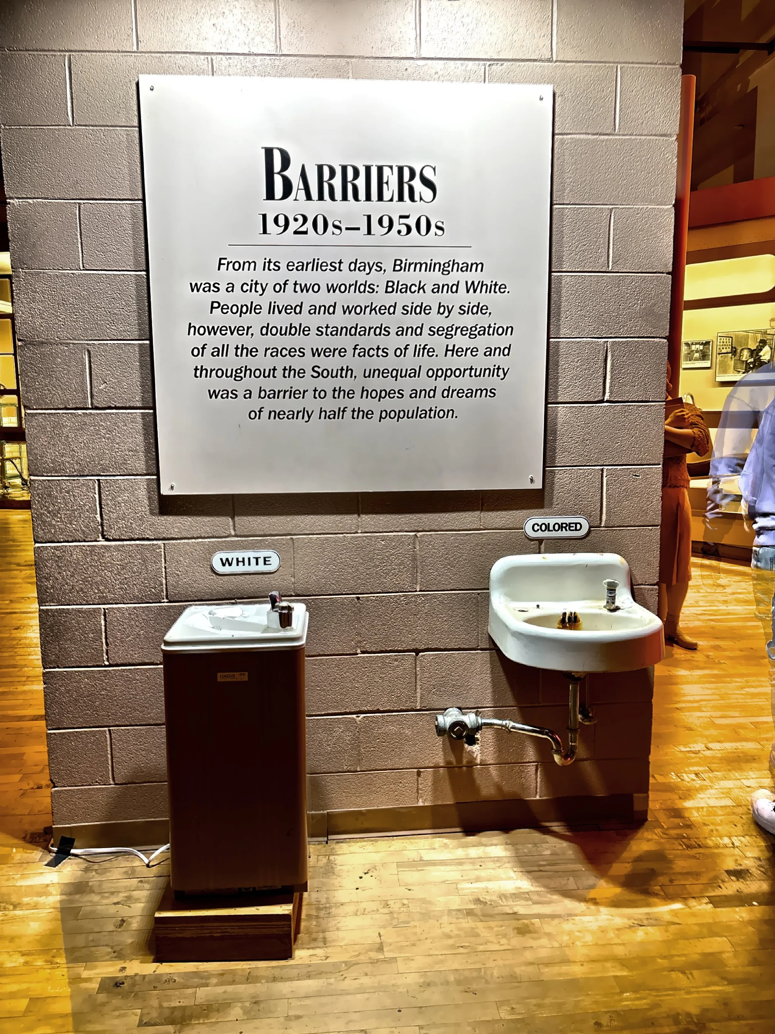  The Barriers Gallery displays: separate water fountains and segregated schools and buses reminding us that Birmingham was a city divided into two worlds in the early 20th century. 