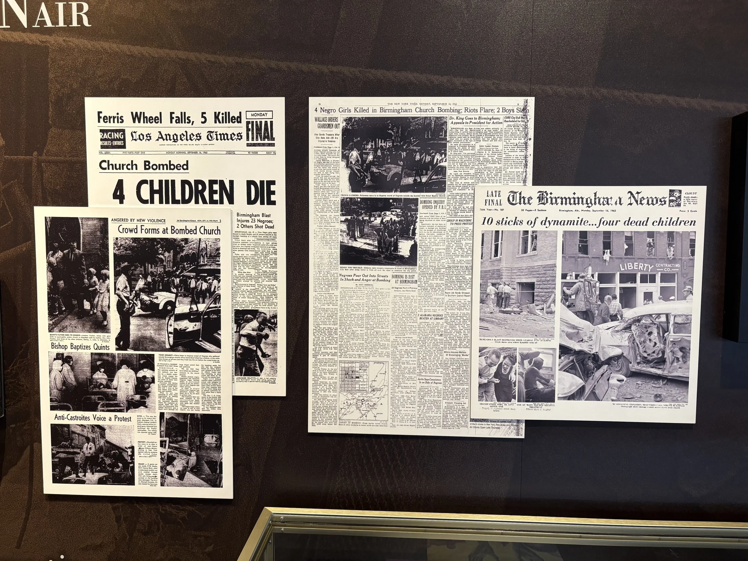  This display shows how different newspapers carried the 1963 KKK Birmingham church bombing story.  The LA Times had the story on page 3; NY Times covered it on page 26; While the Birmingham News made it front page news. 