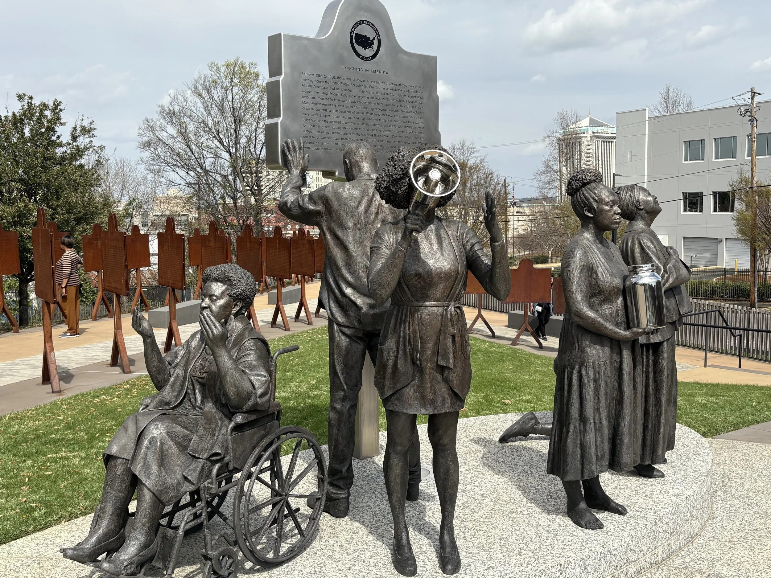  This is a sculpture dramatizing local residents advocating to remember the forgotten lynching stories. 