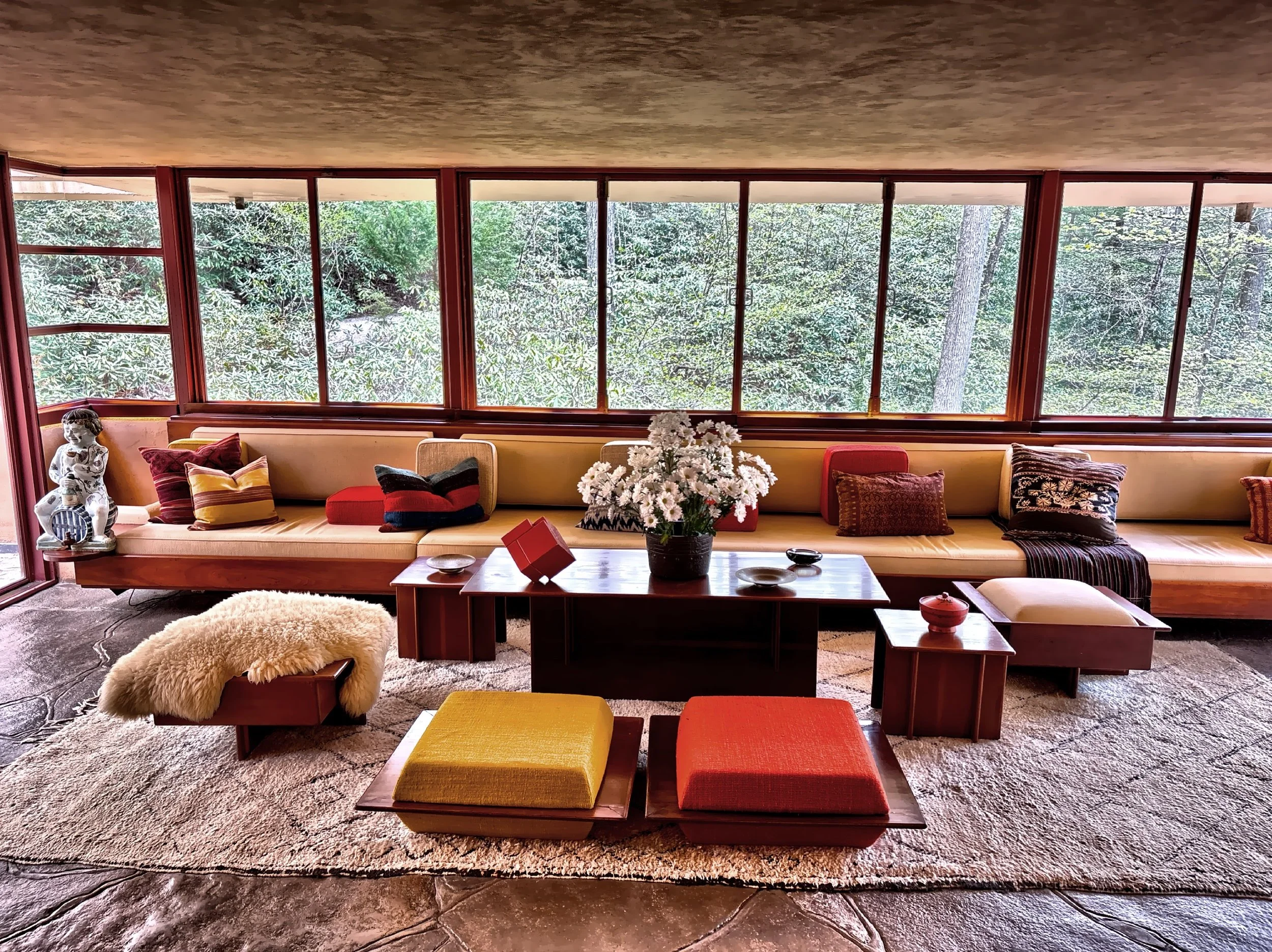  Wright furnished the interior with built-in and freestanding furniture he designed specifically for Fallingwater. 