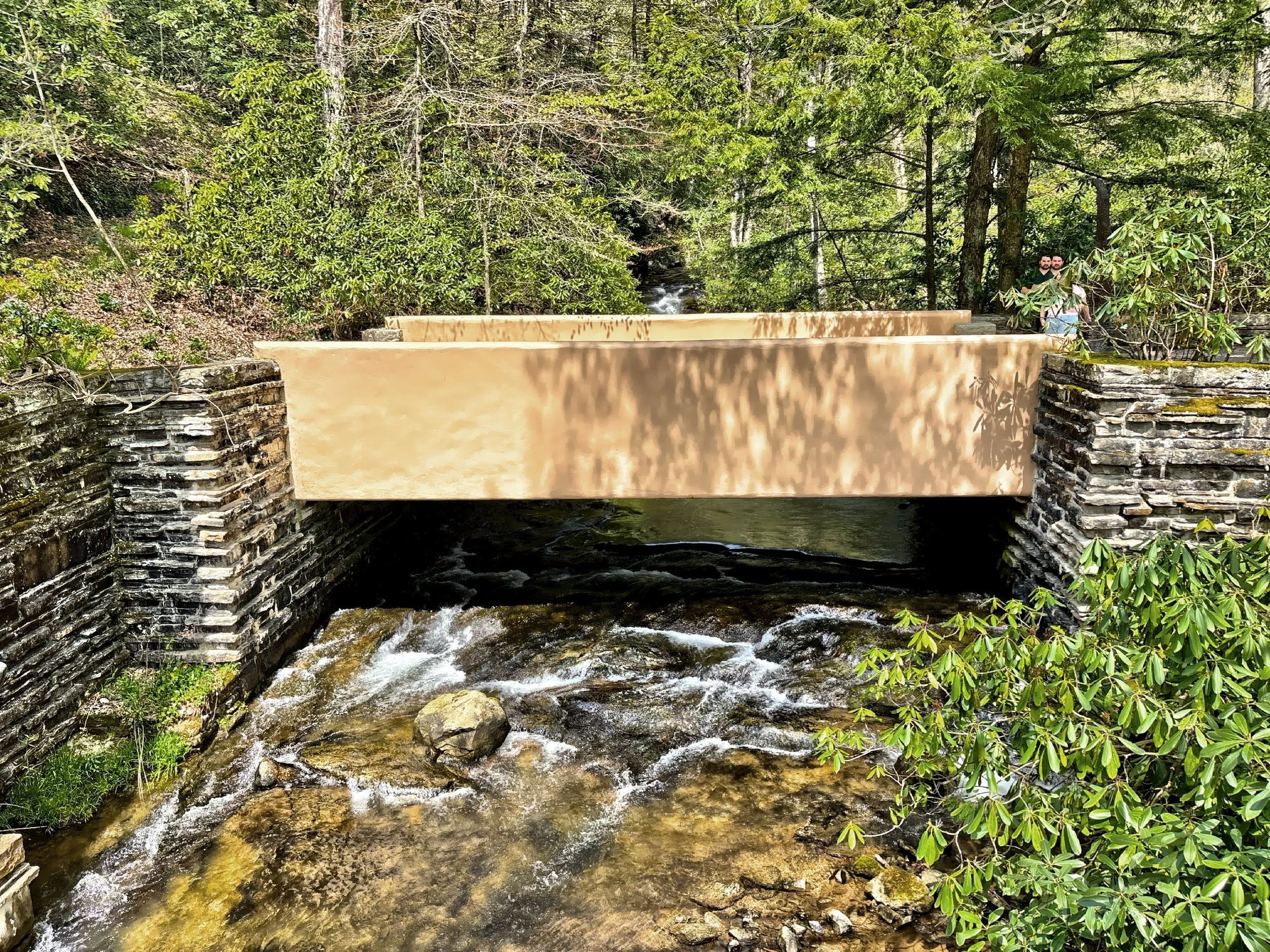  The bridge crossing the waterfall to the house 