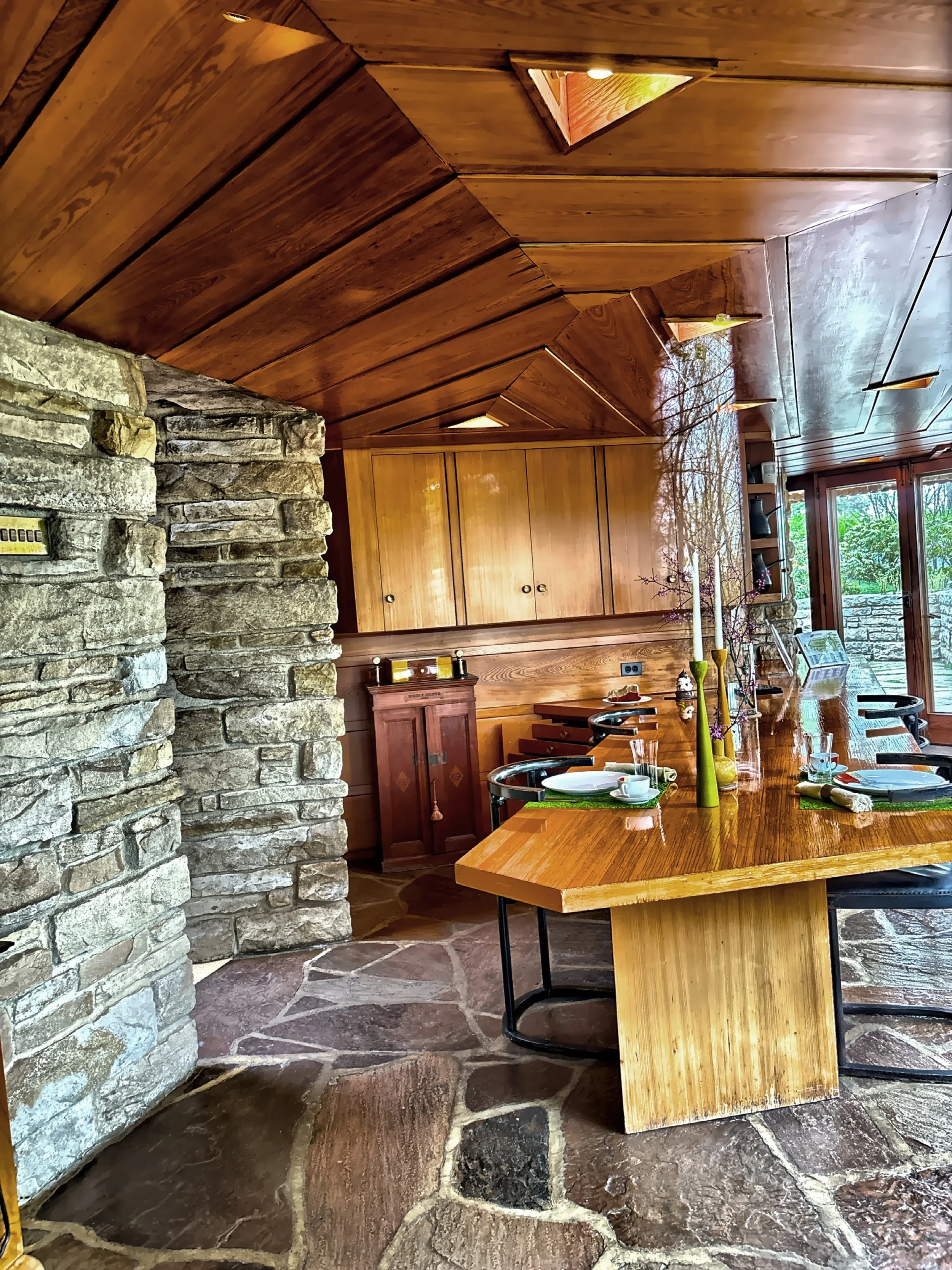  The dining area with a configurable table designed by Wright. 