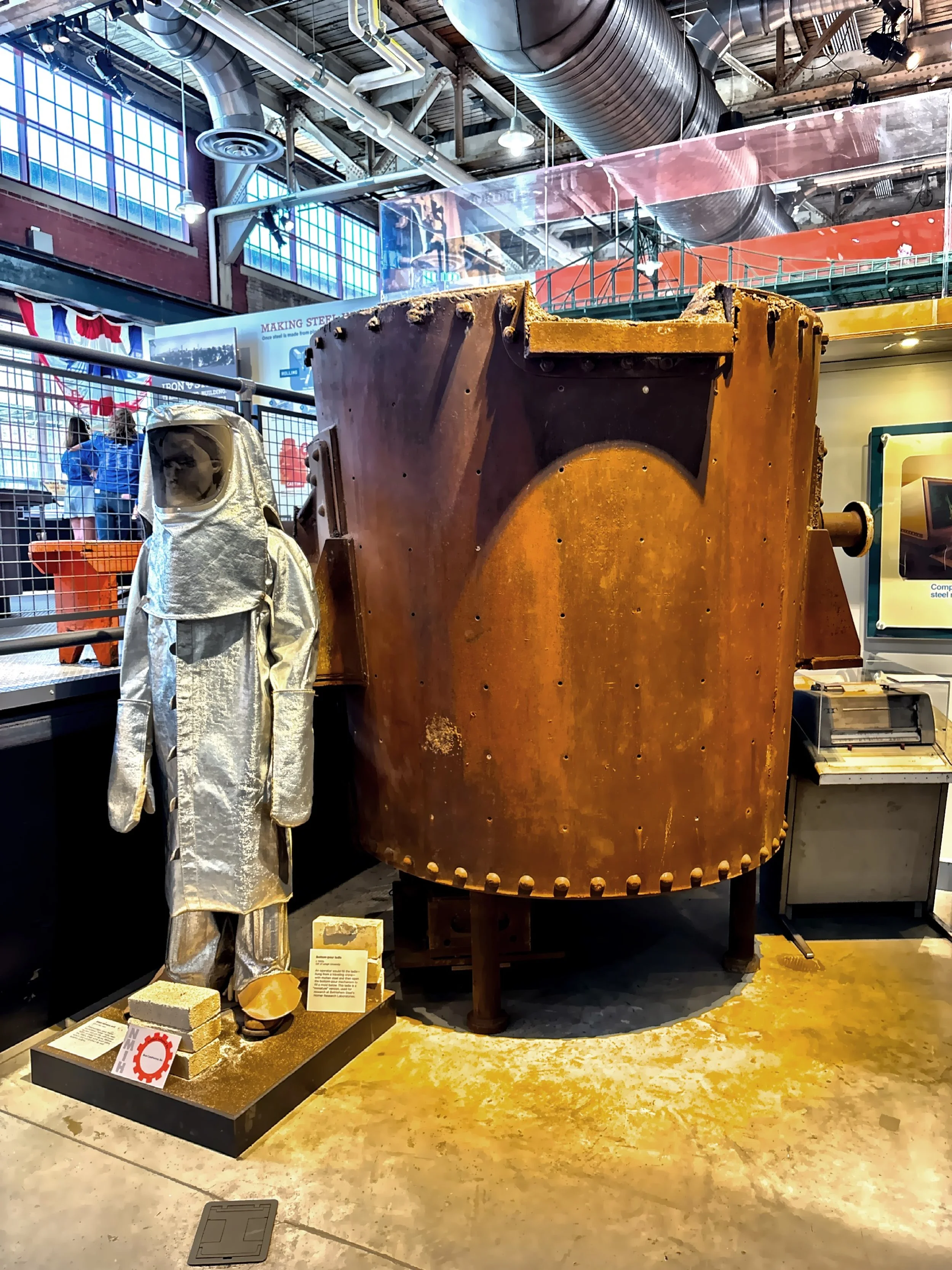  This is a display of a steelworker’s asbestos suit to protect them from the extreme heat. They were used from the 1920’s to late 70’s early 80’s.  Prior to these suits, workers were wearing wool coats. 