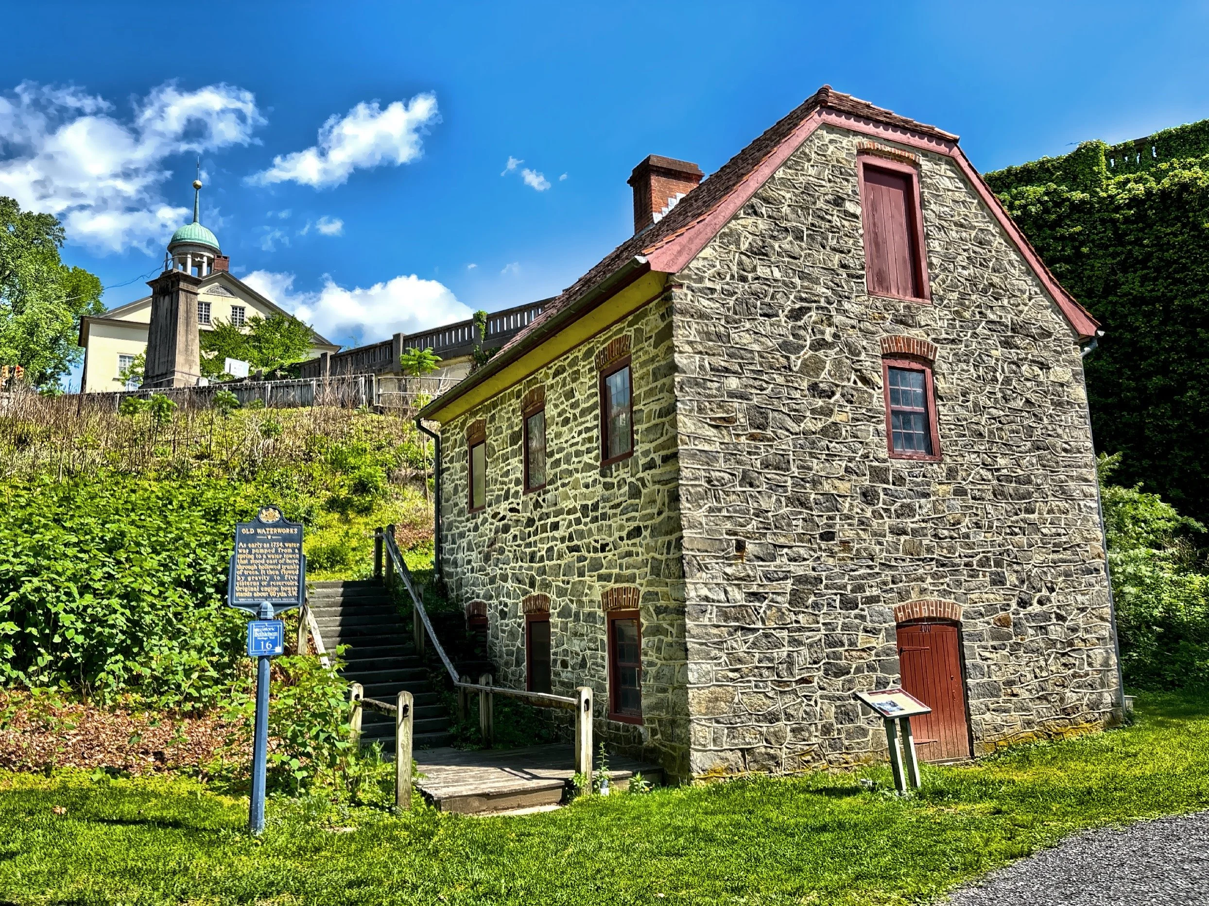  As early as 1754, this old waterworks building was a part of the system pumped from a spring to a water tower, that stood near this building, through hollowed trunks of trees.   