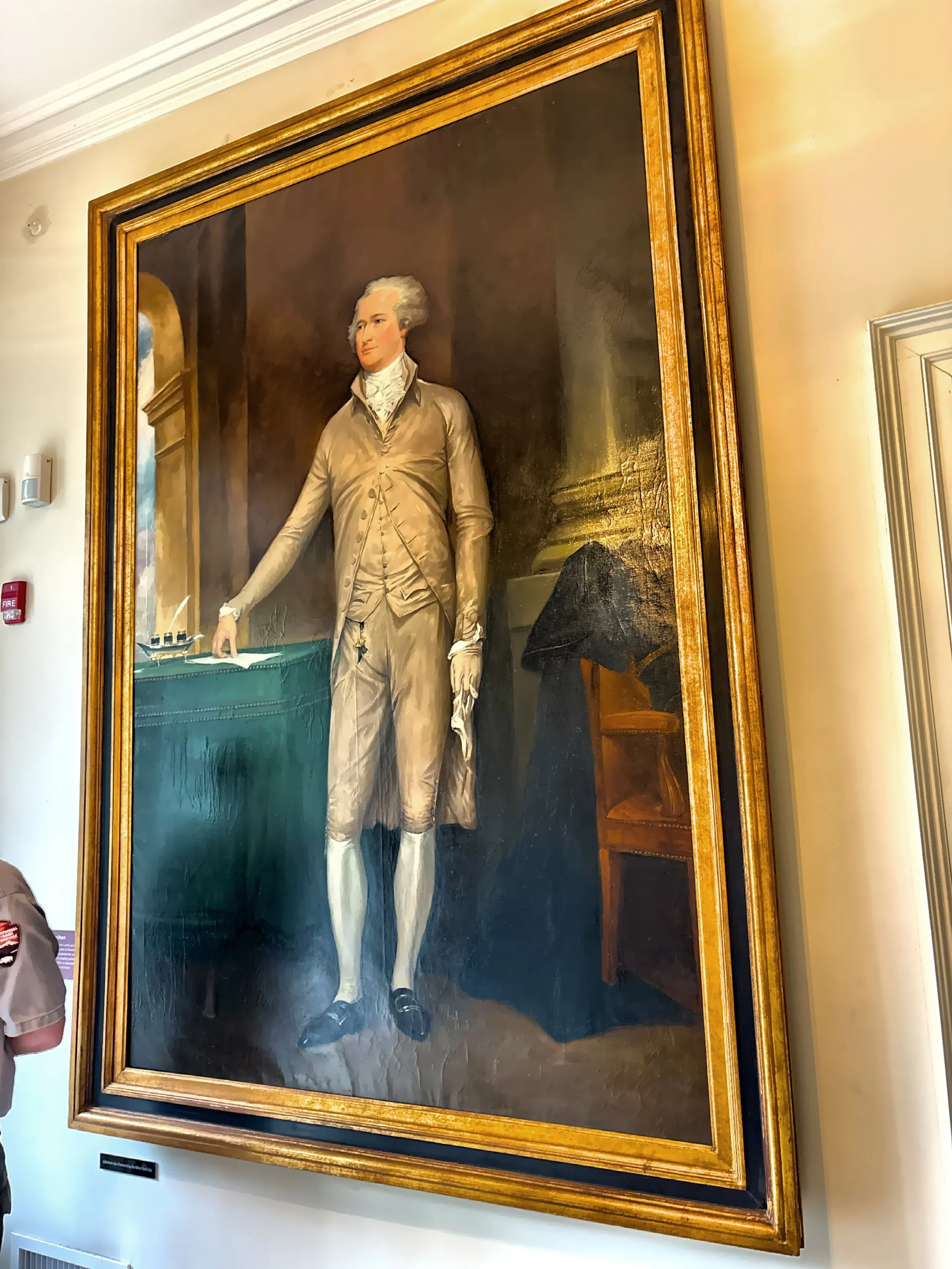  A portrait and bust of Hamilton greet visitors in the front hall. 