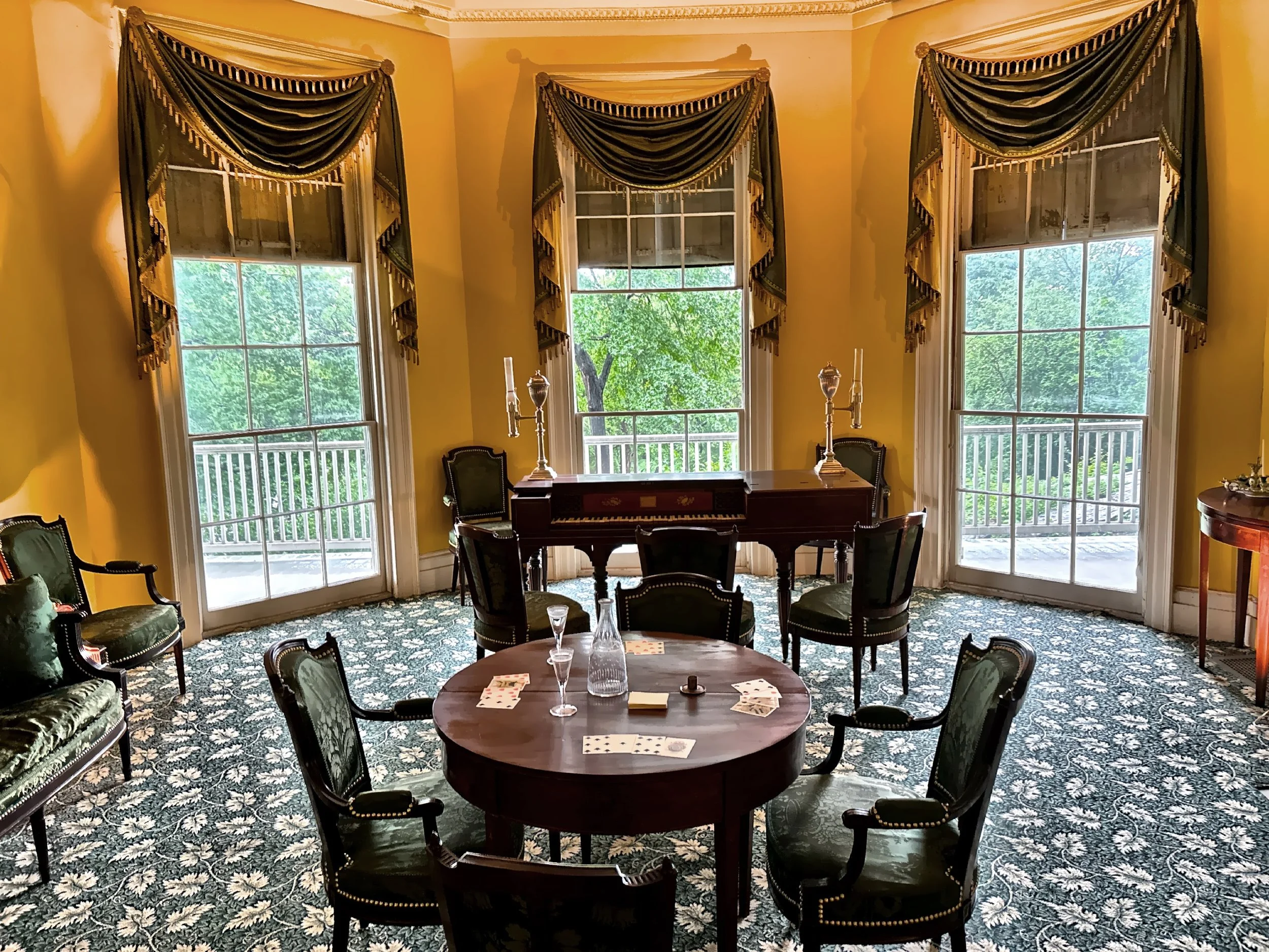  In the first floor parlor, with piano, has furniture attributed to Adam Hains. 