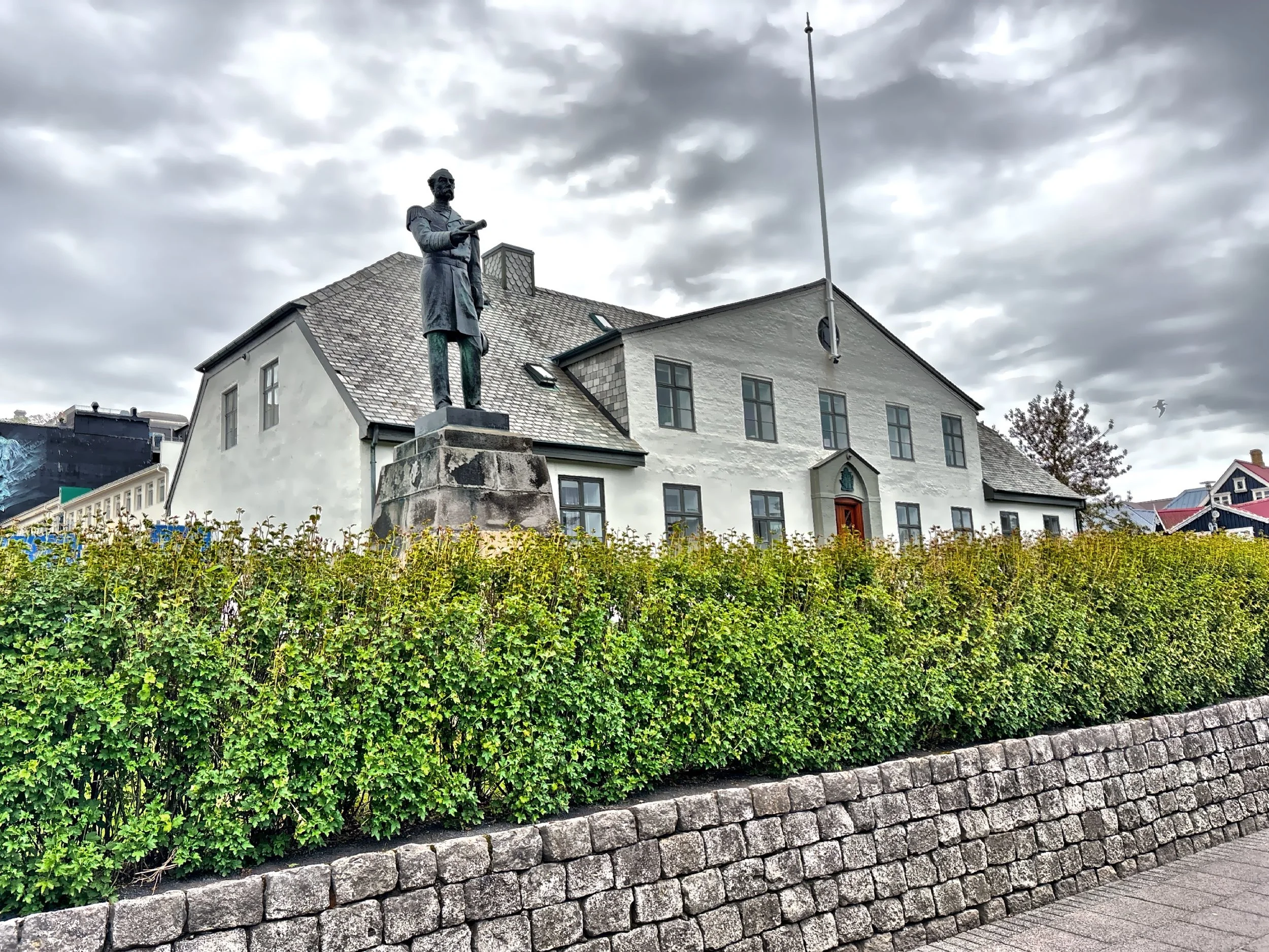 A statue of King Christian IX in front of the Government House building. 