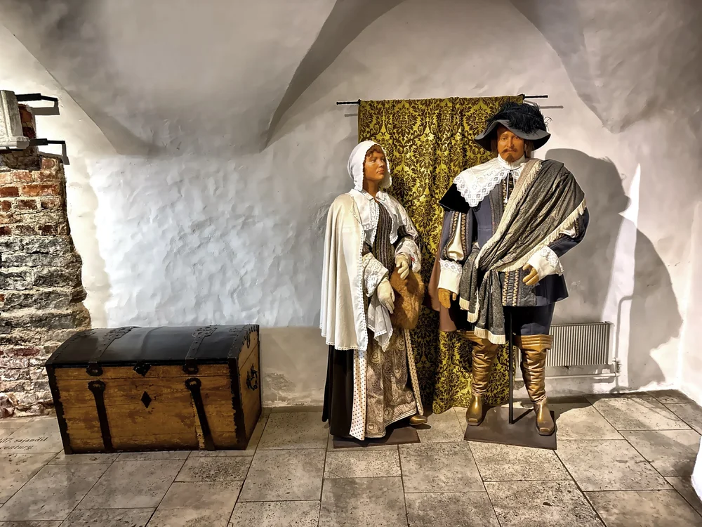  Inside the building  has a medieval feel with stone walls, and antique furnishings. 