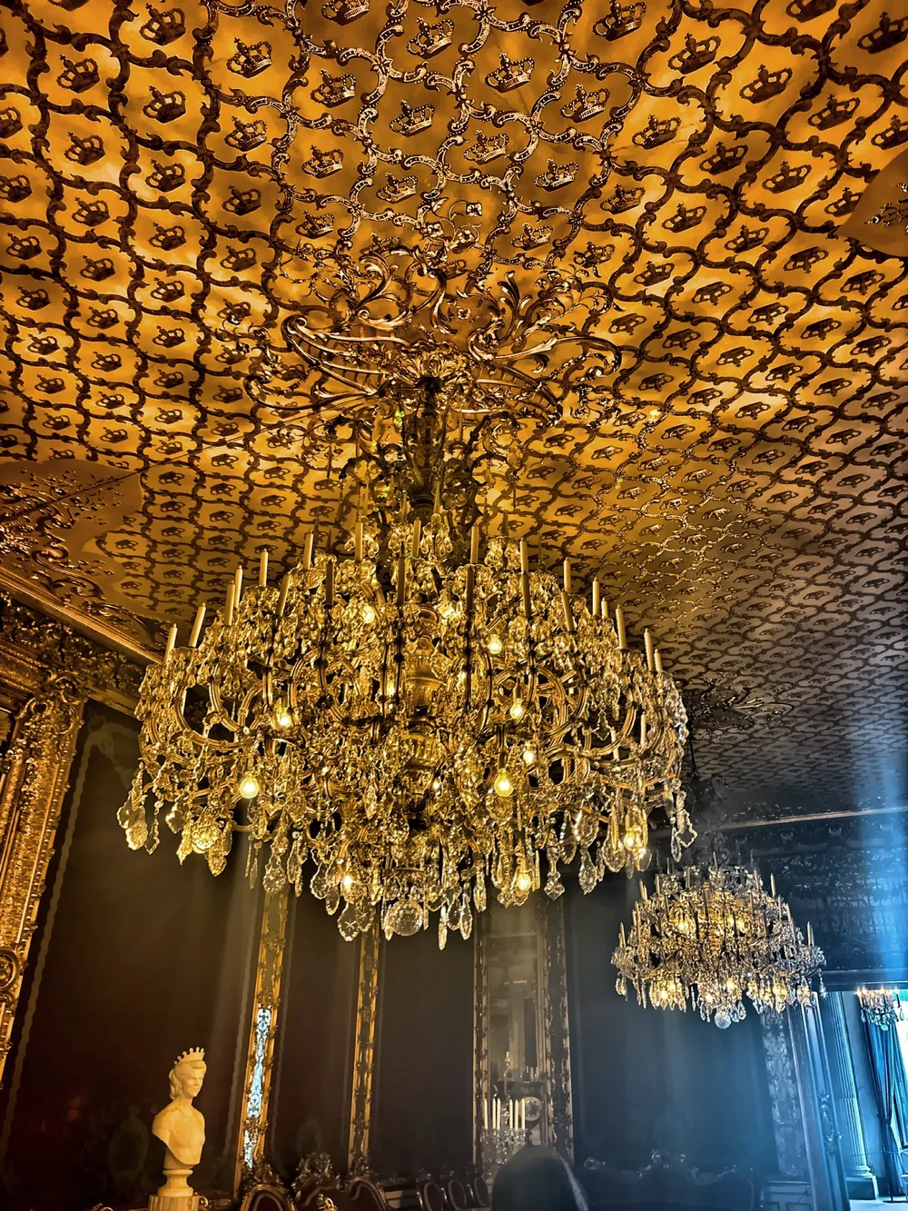  There are gilded ceilings, crystal chandeliers, and antique furniture throughout. 