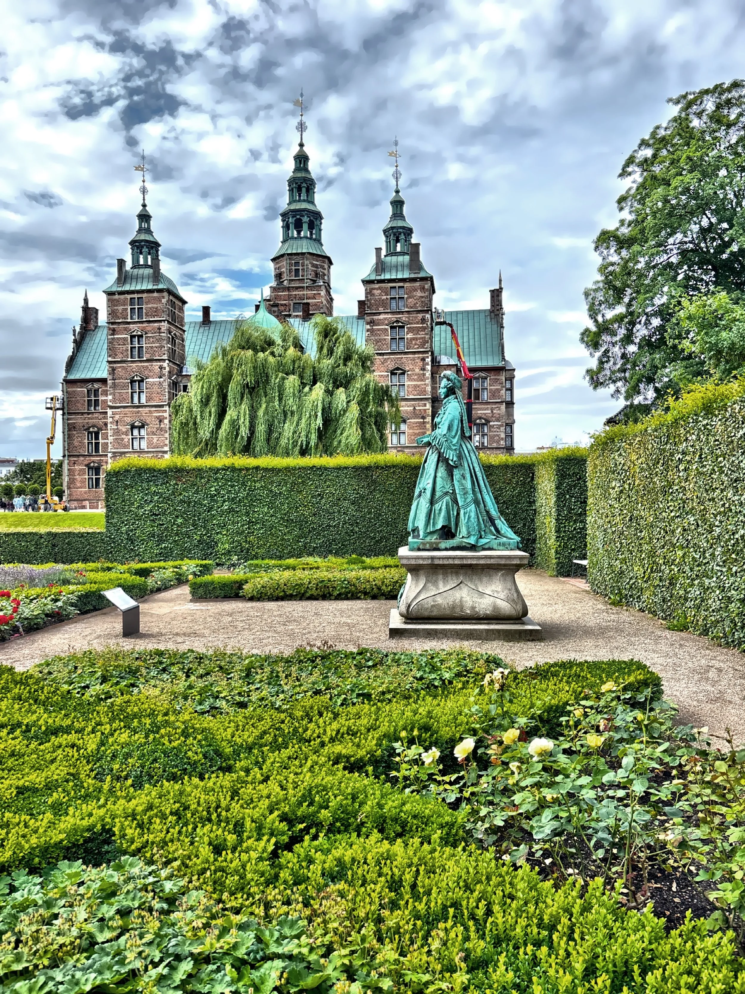  The castle is surrounded by Kongens Have, Denmark's oldest royal garden, open to the public and beautifully maintained.  The statue is of Queen Caroline Amalie of Augustenburg.    
