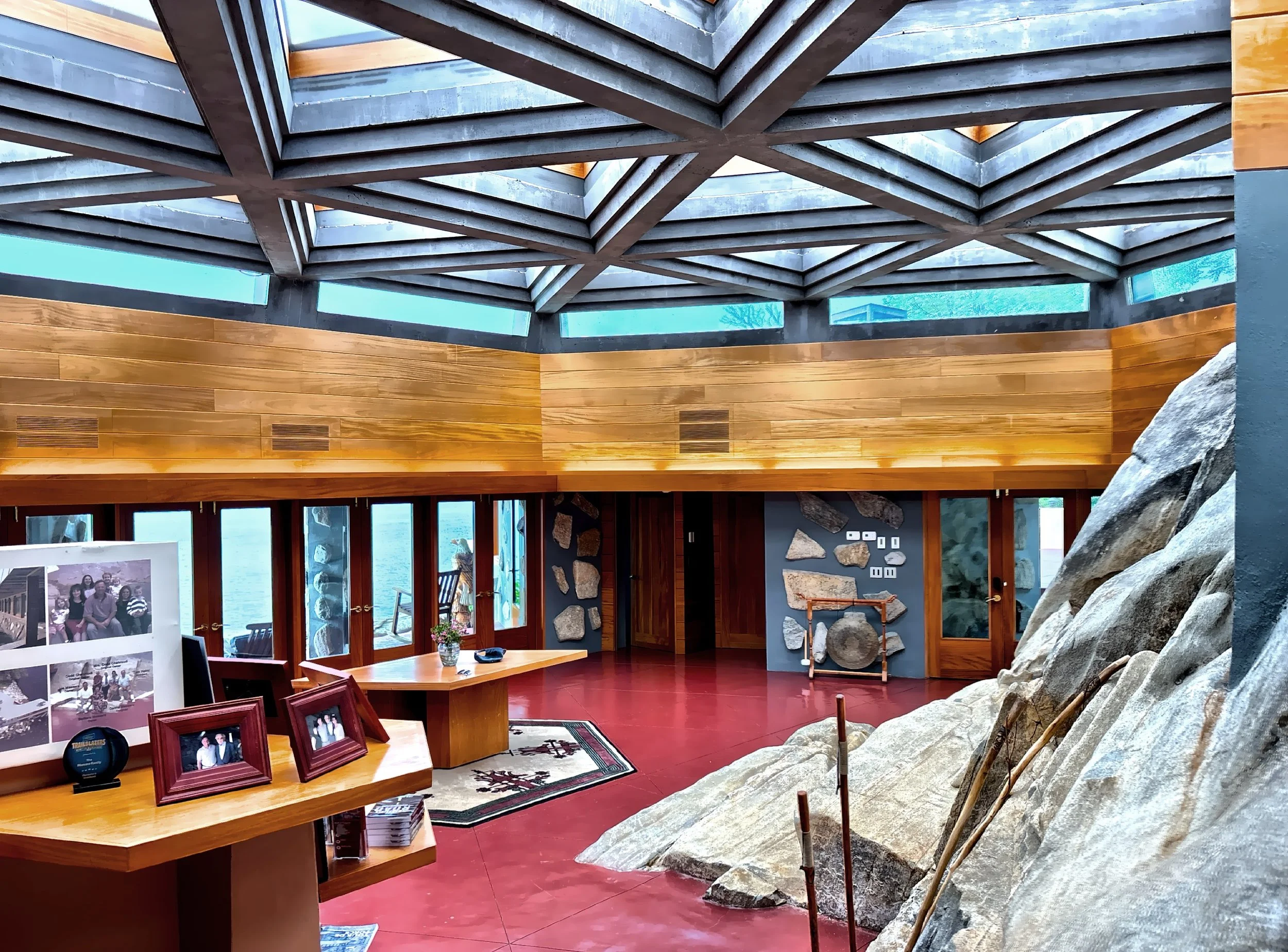  The huge boulder juts into both the skylit living area and kitchen, becoming a functional, sculptural feature. 