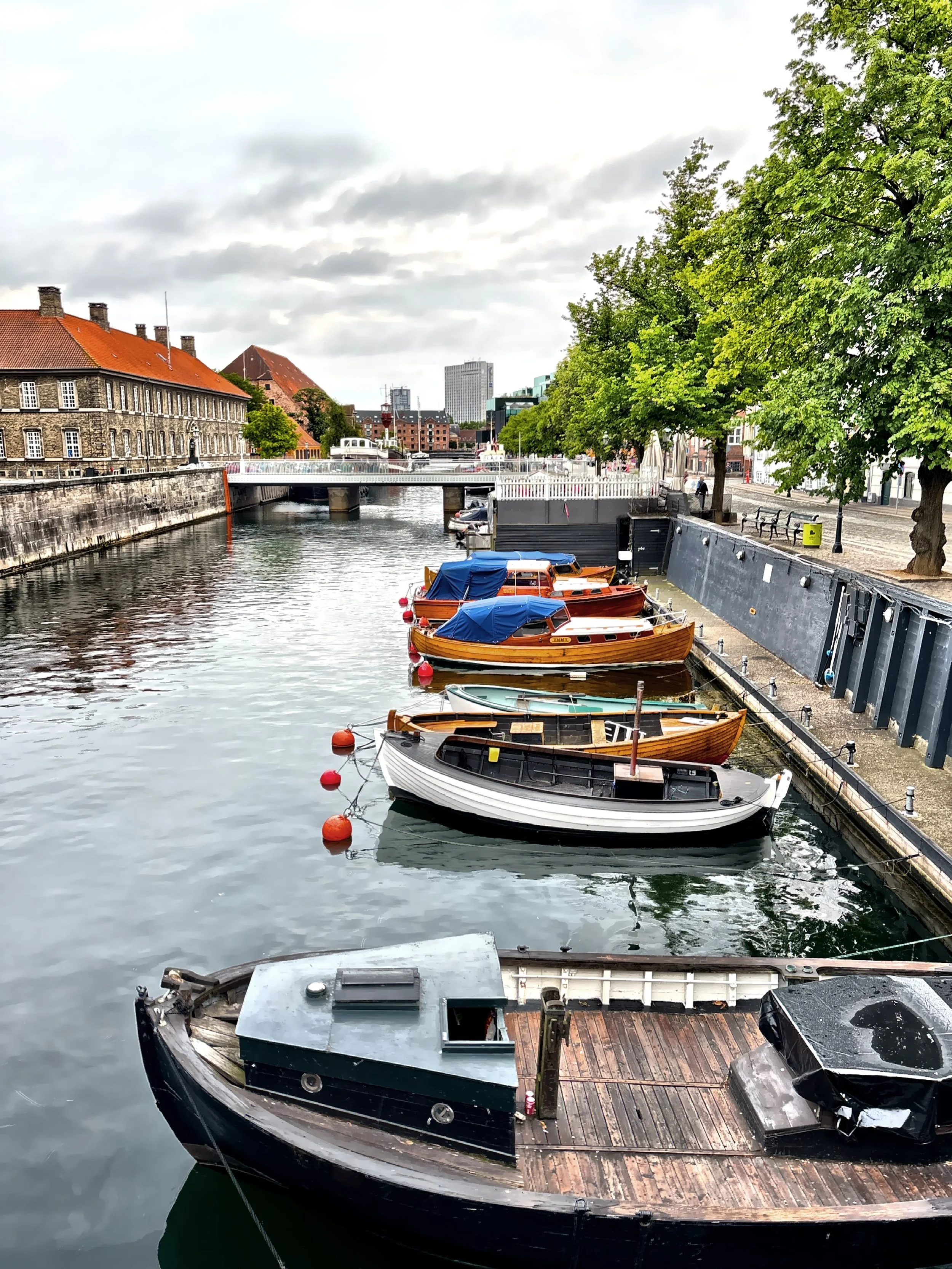  Traditional recreational boats dock along the canal. 