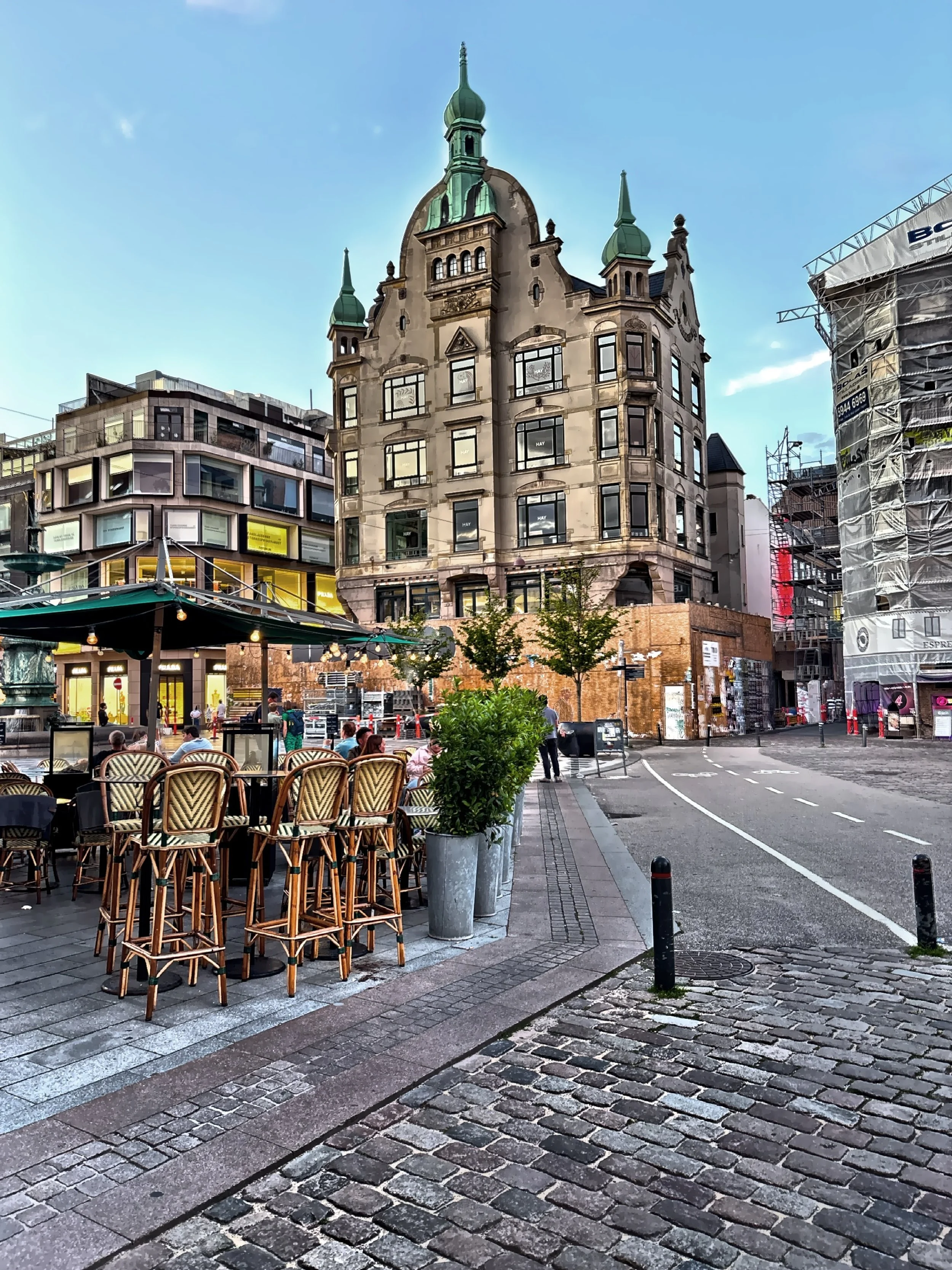  A small square with the HAY House, the flagship store of the Danish design company, in the background. 