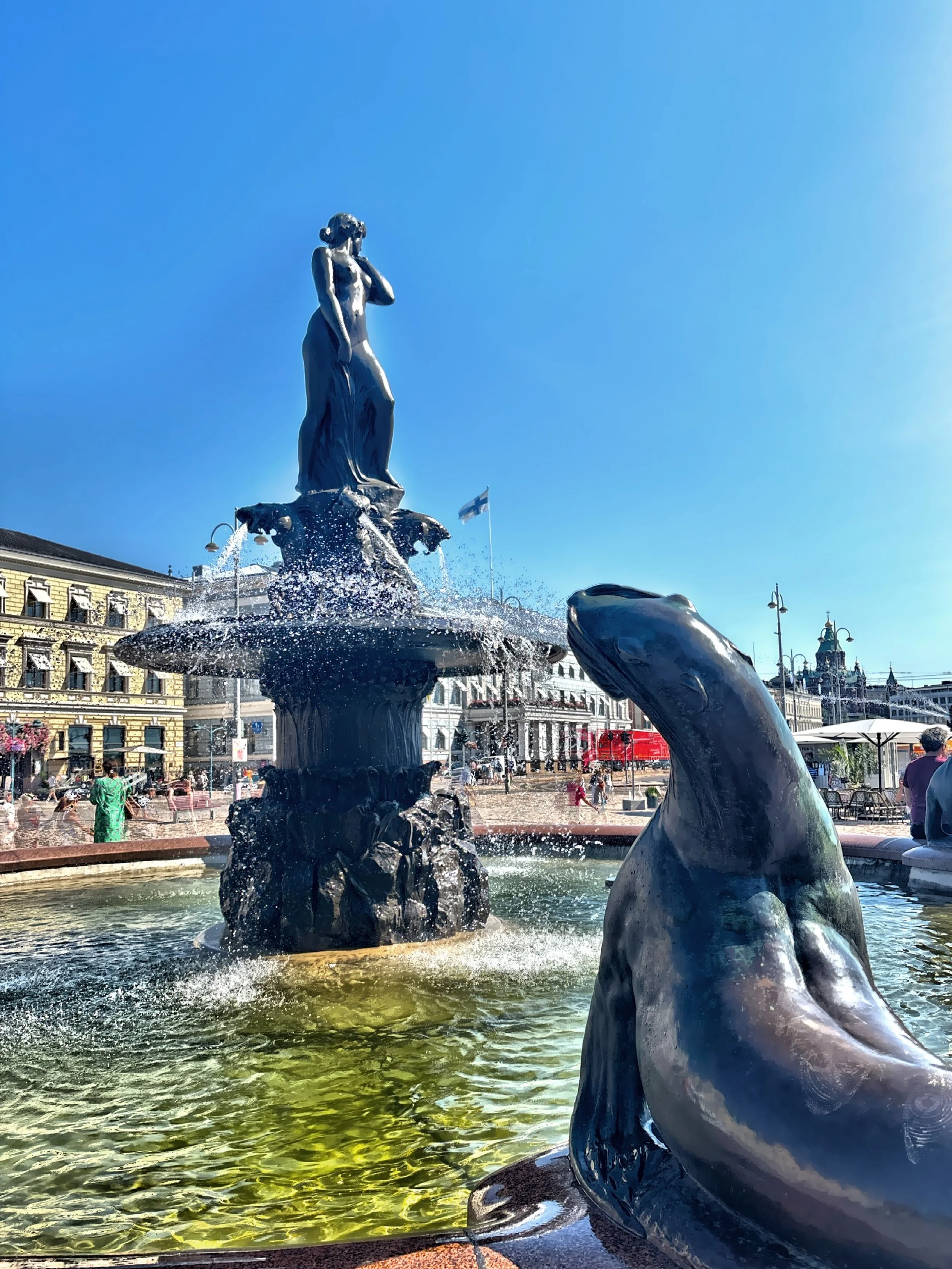  Havis Amanda, the bronze sculpture by Ville Vallgren unveiled in 1908, depicts a mermaid rising from the sea, symbolizing Helsinki’s rebirth—portraying the city as emerging modern and cosmopolitan from the surrounding Baltic Sea. 