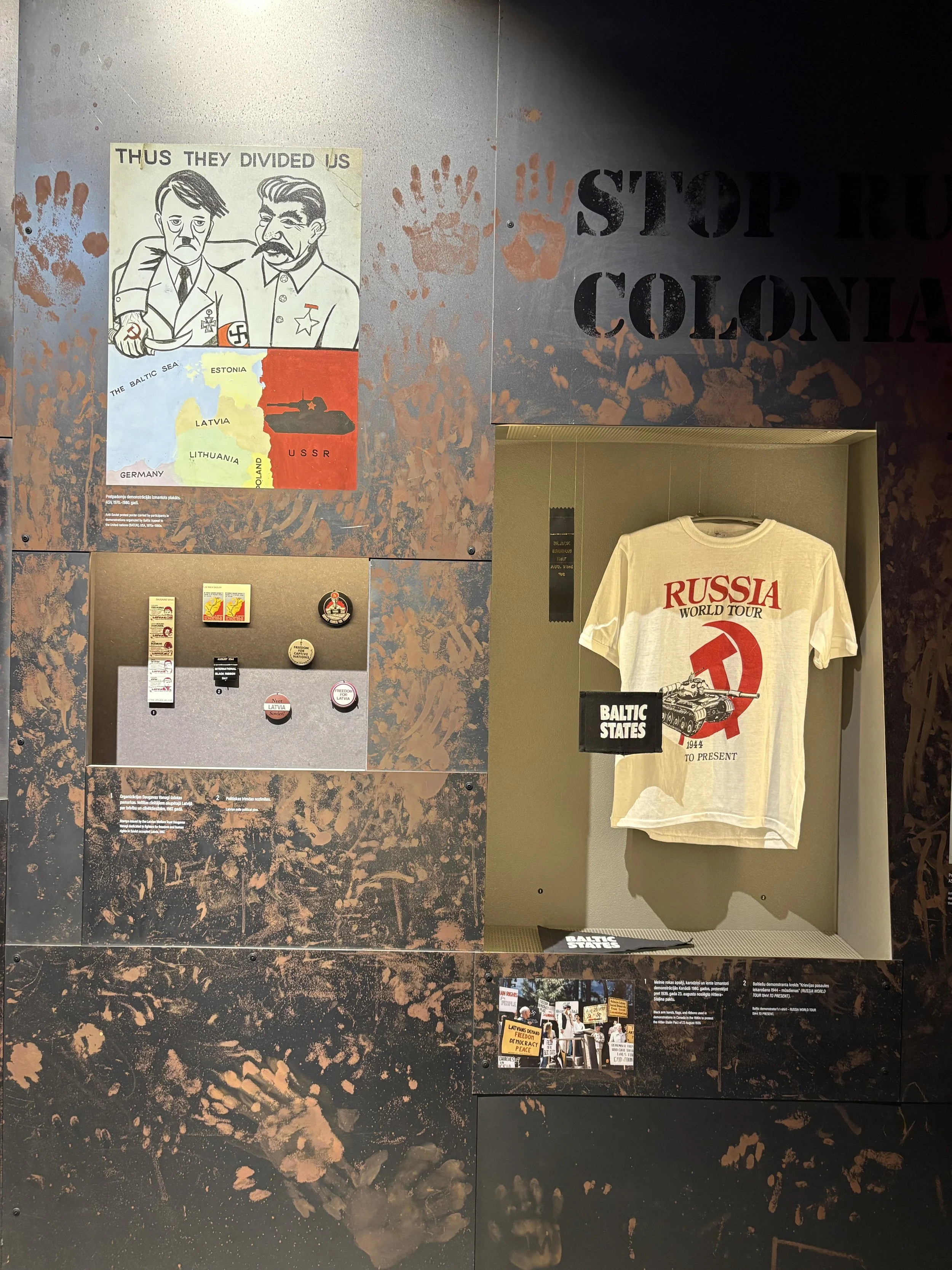  Some of the exhibits include propaganda posters, photographs of deportations, personal belongings from those imprisoned or exiled, documents from secret police files and recreated prison cells 