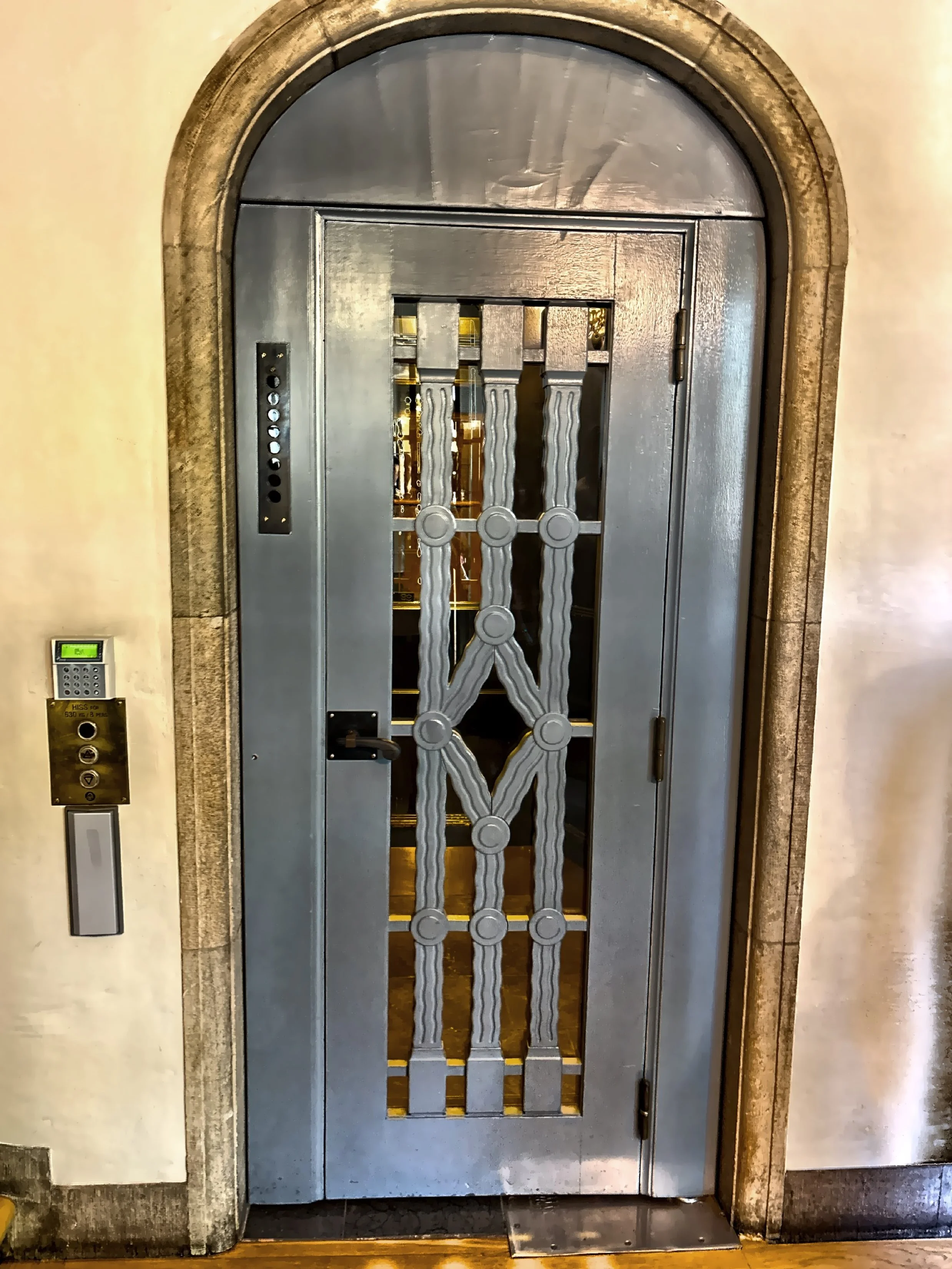  An ornate elevator door 