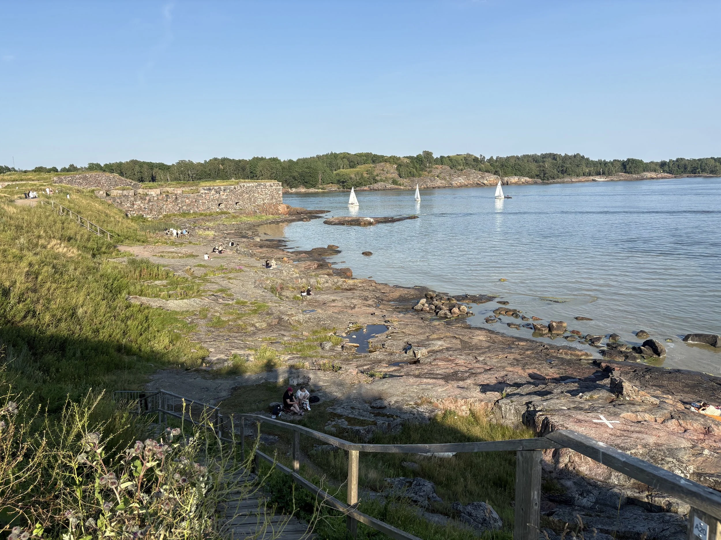  In summer, both locals and tourists can be seen relaxing in the green parks or at the little sandy beach. 