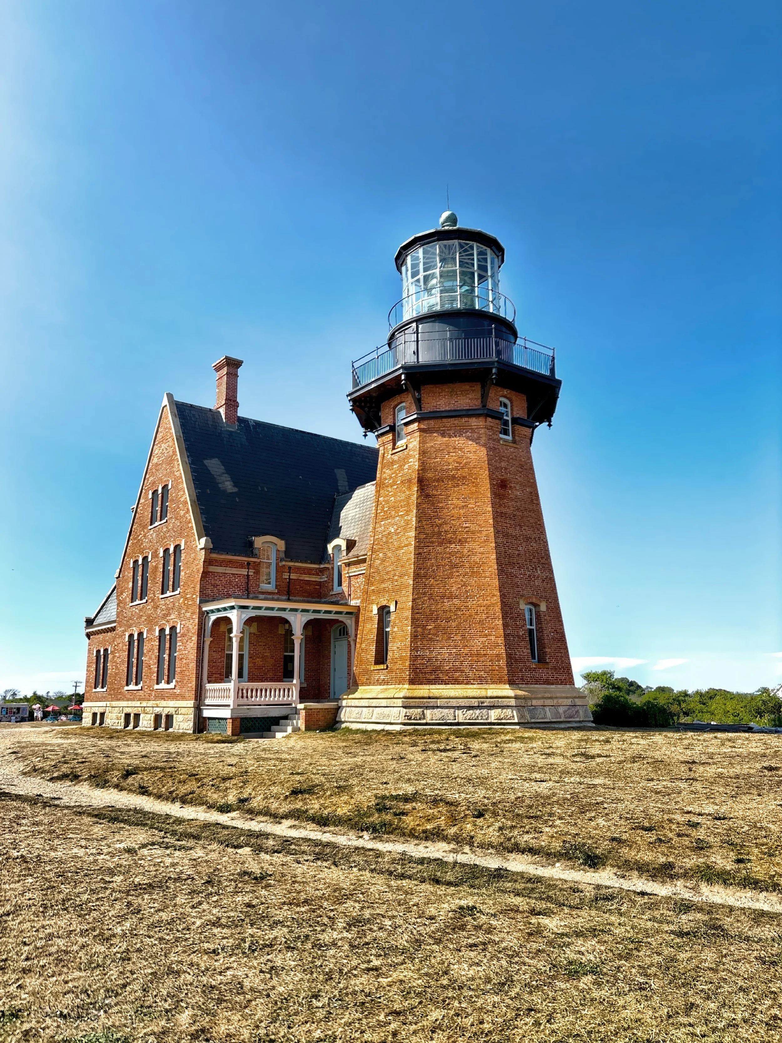  The Gothic-style Southeast Light, built in 1874, is perched atop the Mohegan Bluffs is not just a navigational landmark, but an architectural gem.  