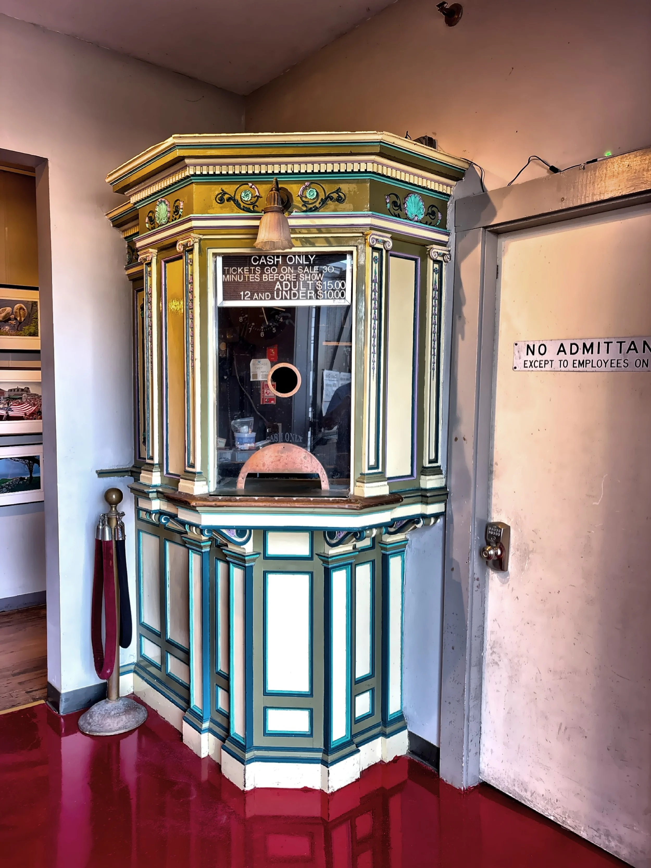  The ticket booth inside the Empire Theater, which was built in 1882 and is one of the few rustic theaters in the United States. 