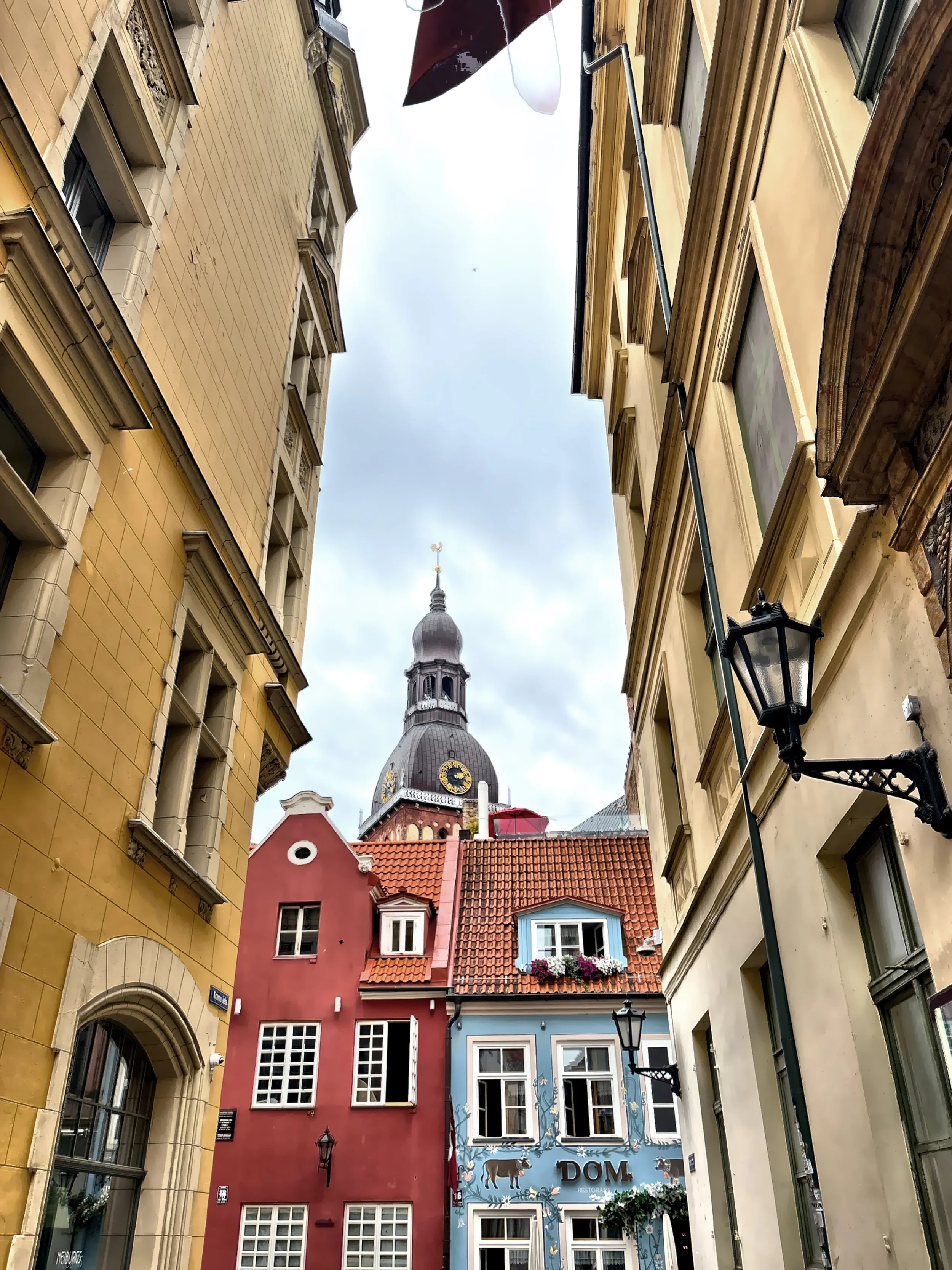  The tower of the Riga Cathedral as seen through one of the narrow streets.  