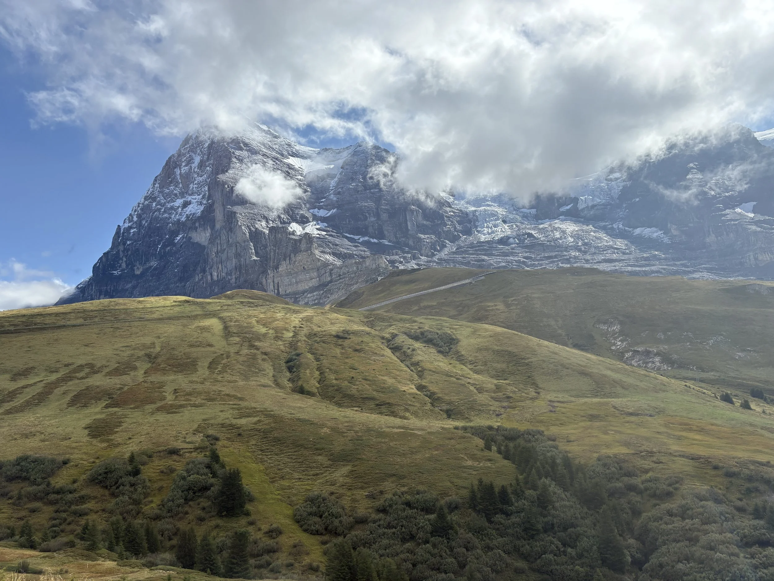  The ascent reveals nature’s stunning metamorphosis, as the rolling green meadows of the valleys gradually yield to a stark, shimmering world of rock, snow, and ice.   