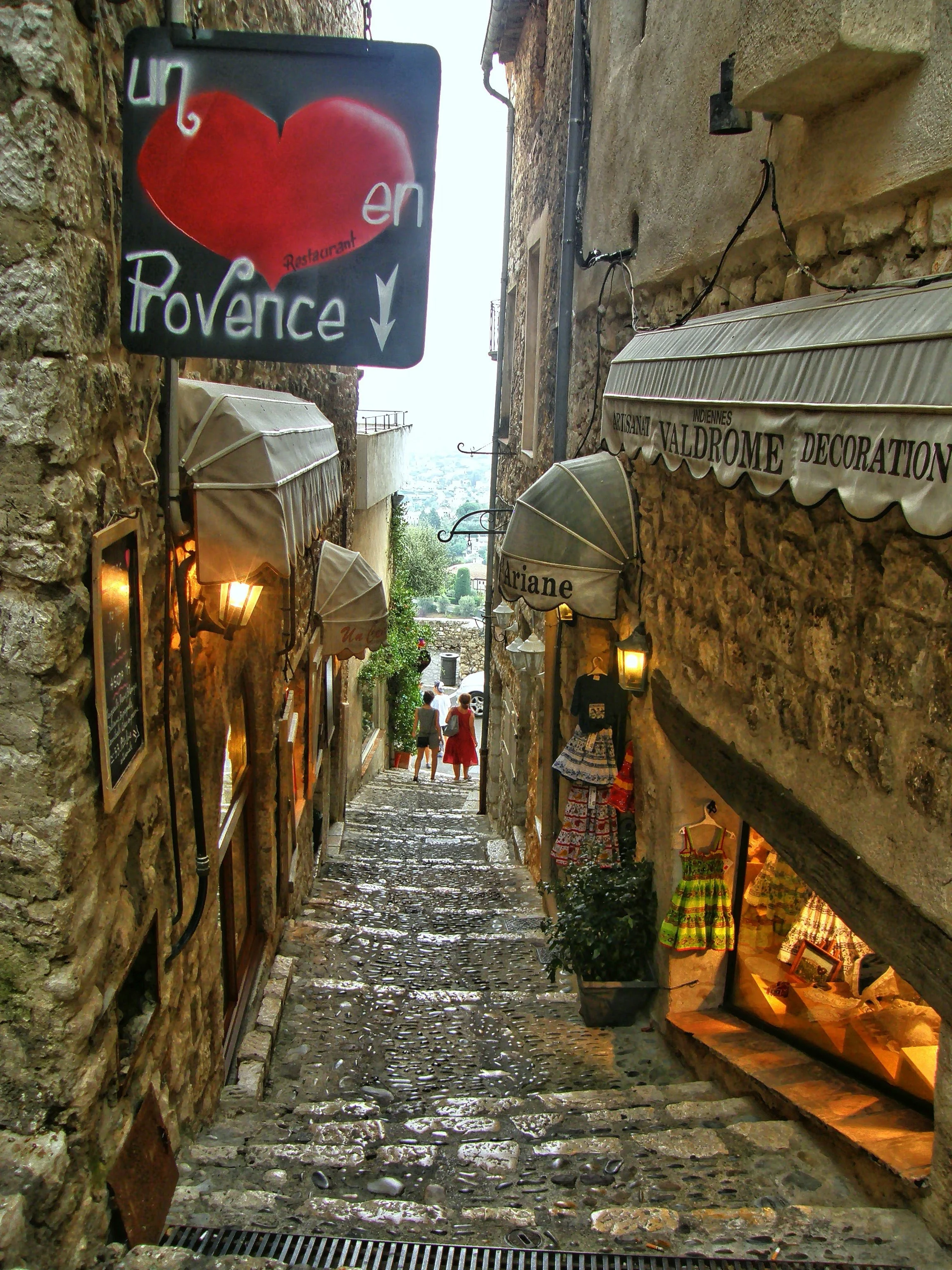  A stroll through the village with medieval architecture, flower-covered walls, and artisan boutiques. 
