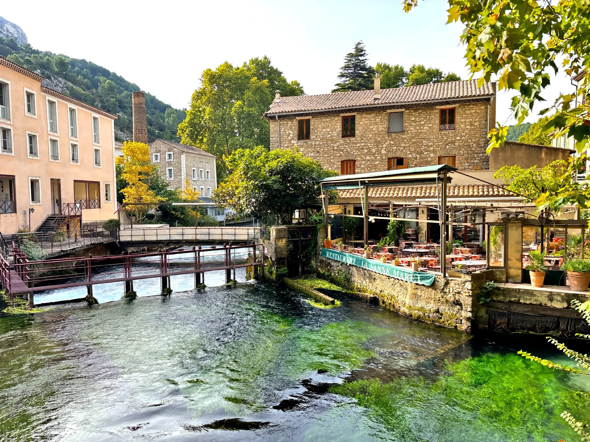  The village is a popular tourist destination, with old water wheels, charming streets and cafes along the river. 