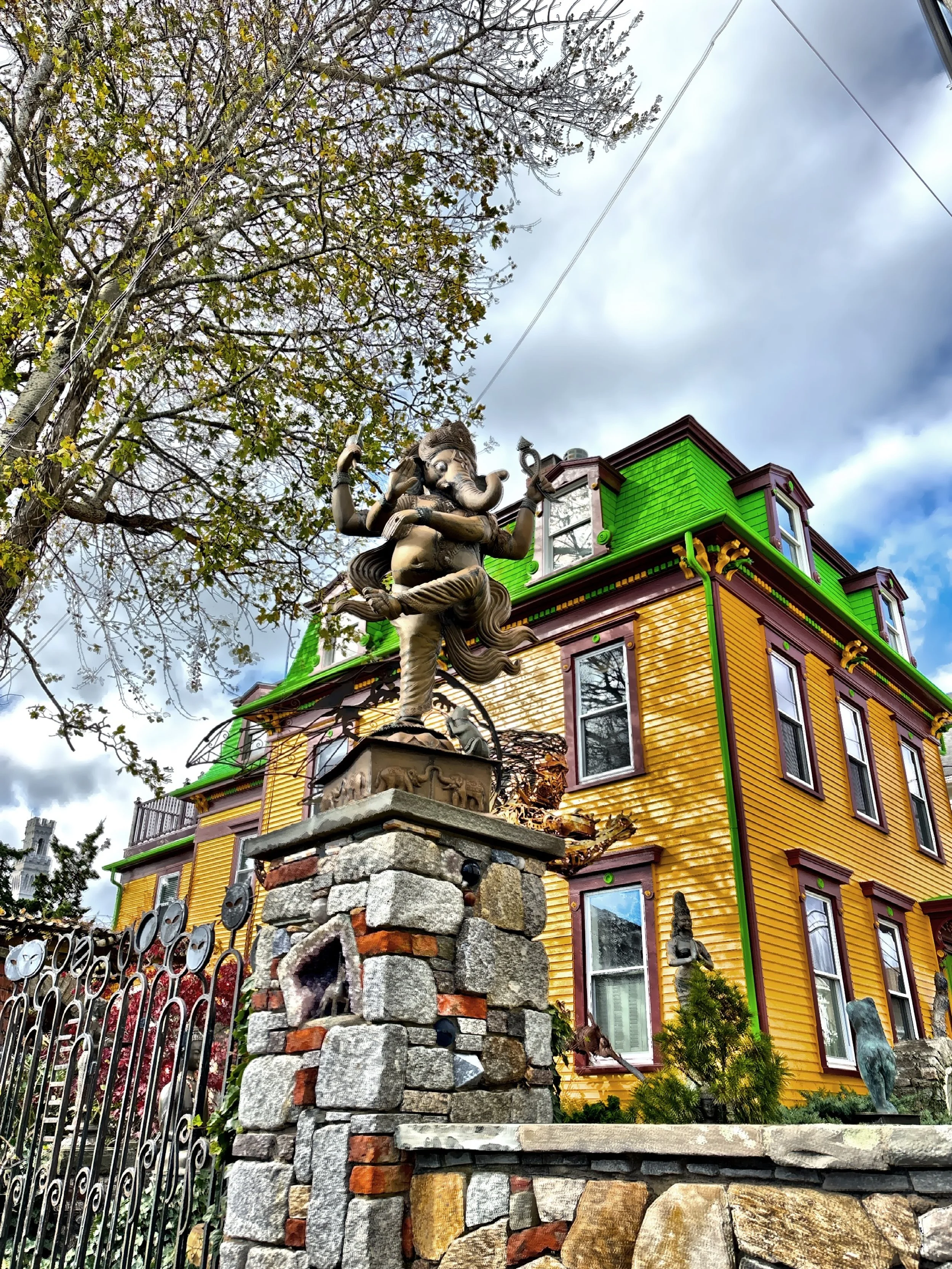  A statue of the Hindu deity Ganesha outside a house on Center Street. 