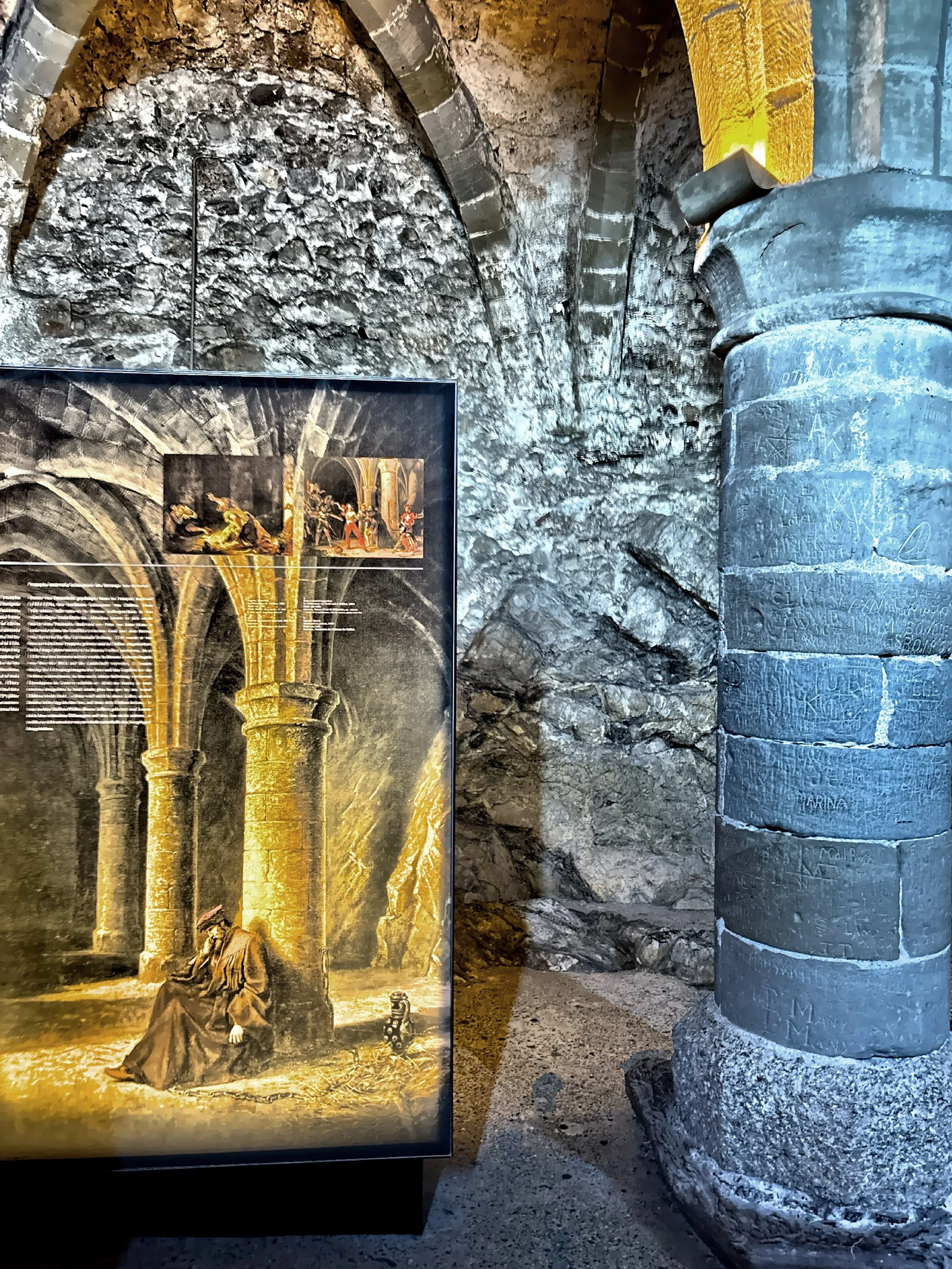  The dungeons, with their cold stone pillars and chains. 