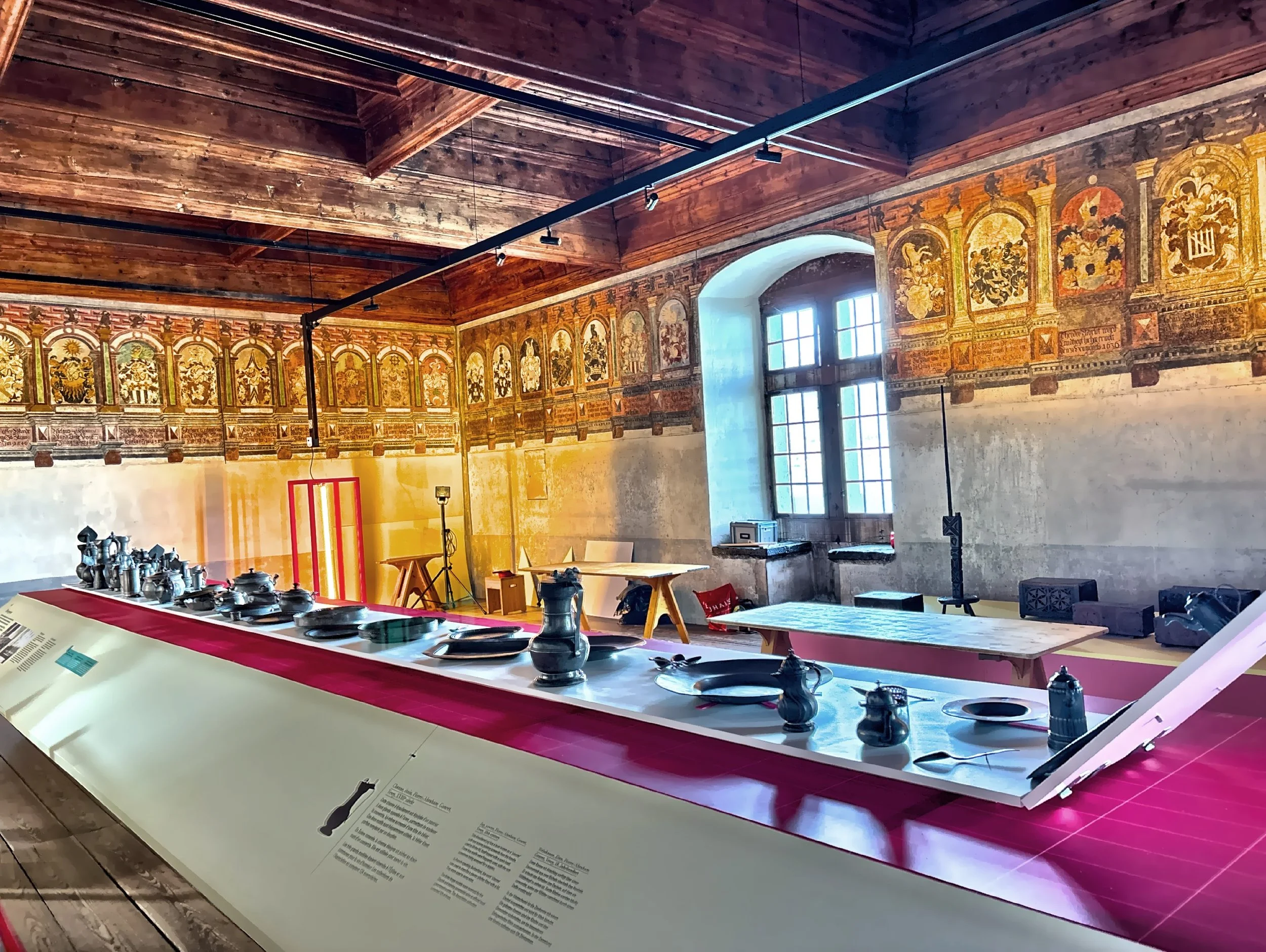  One of the grand halls set up with an exhibit of items used for a banquet. 