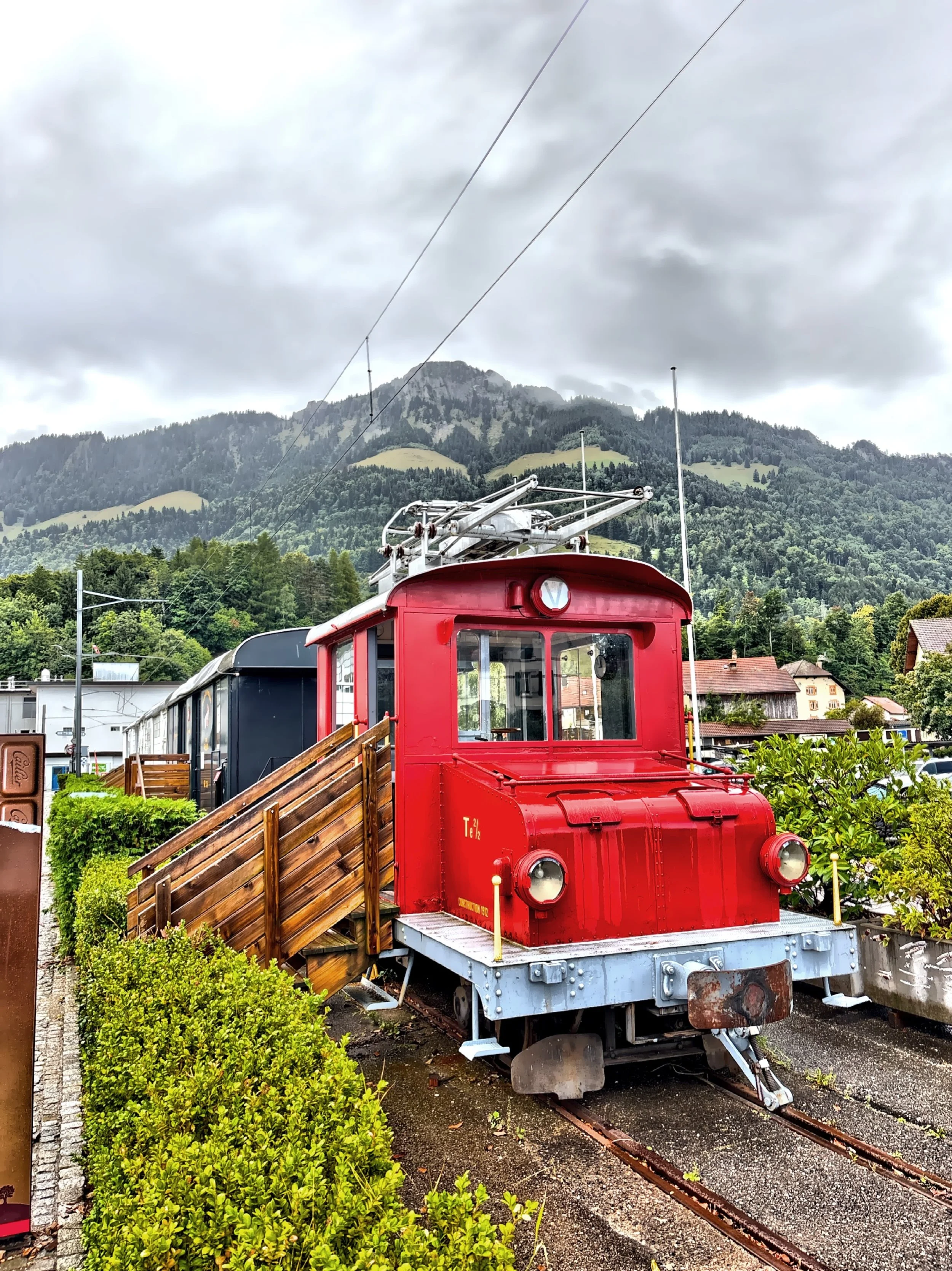  The historic electric motor train carriage outside the factory. 