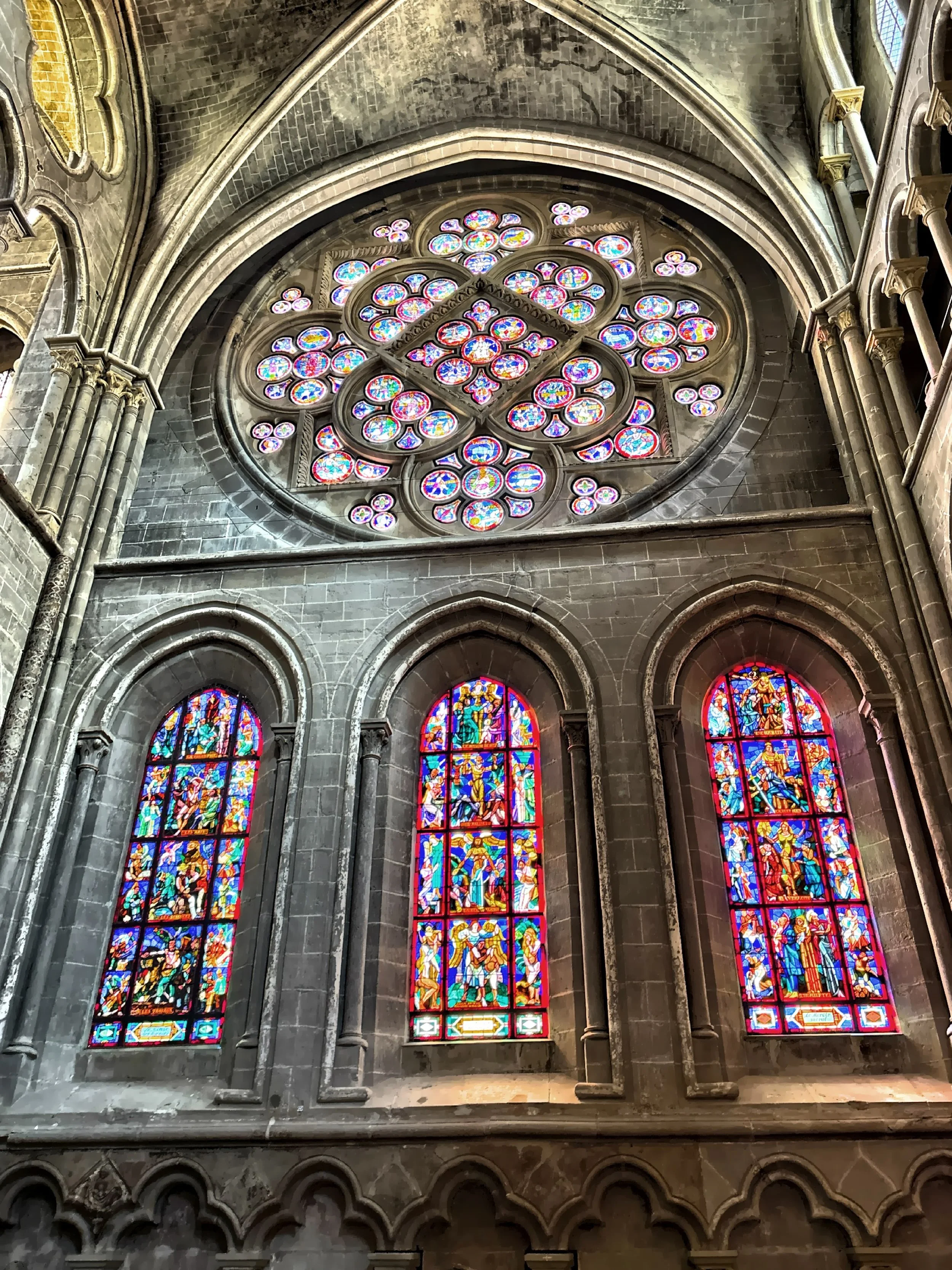  The Rose Window, a 13th-century stained-glass rose window depicts scenes of creation and medieval cosmology. 