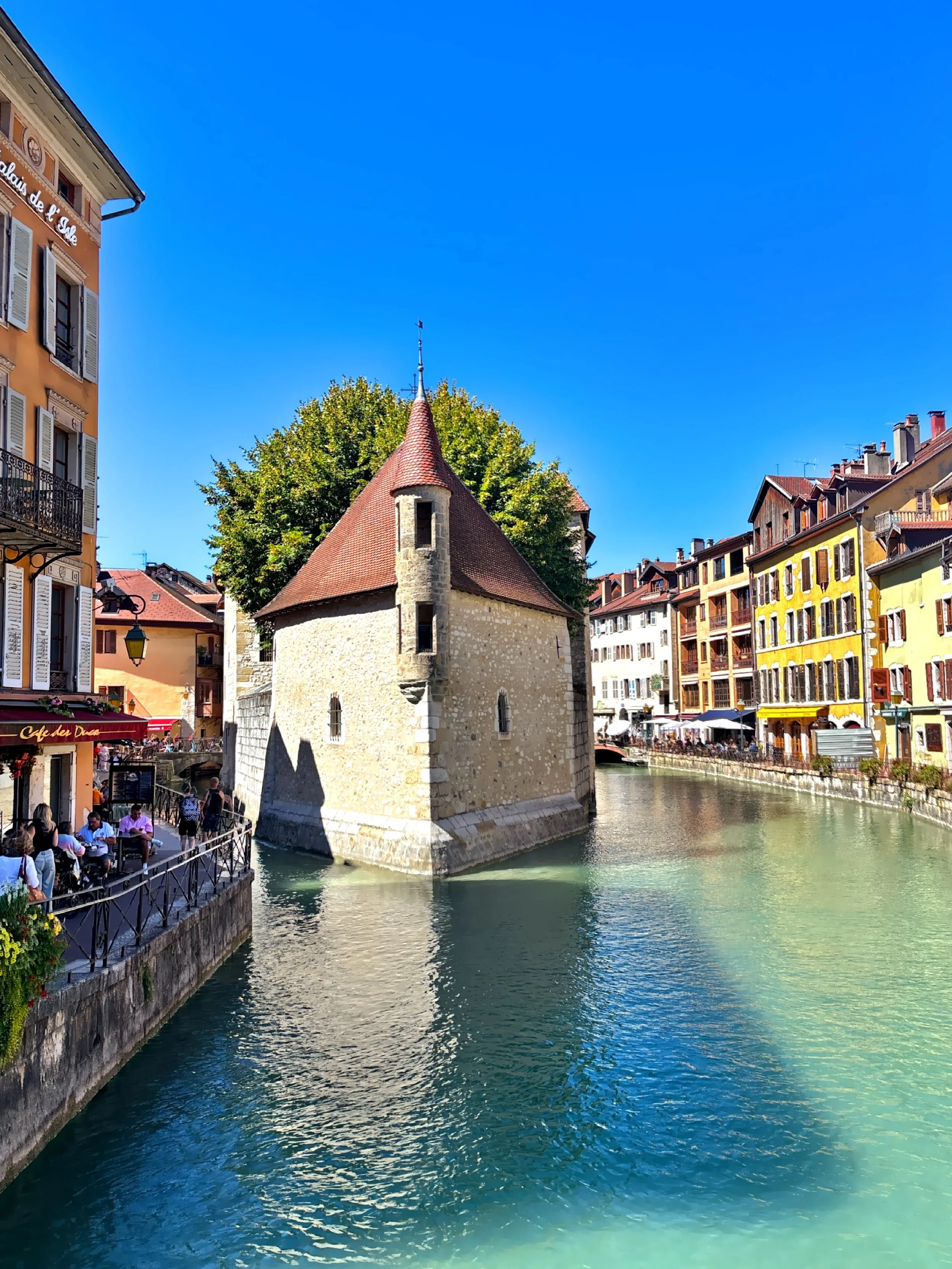 The iconic “floating” medieval fortress, Palais de l’Isle, in the middle of the canal. 