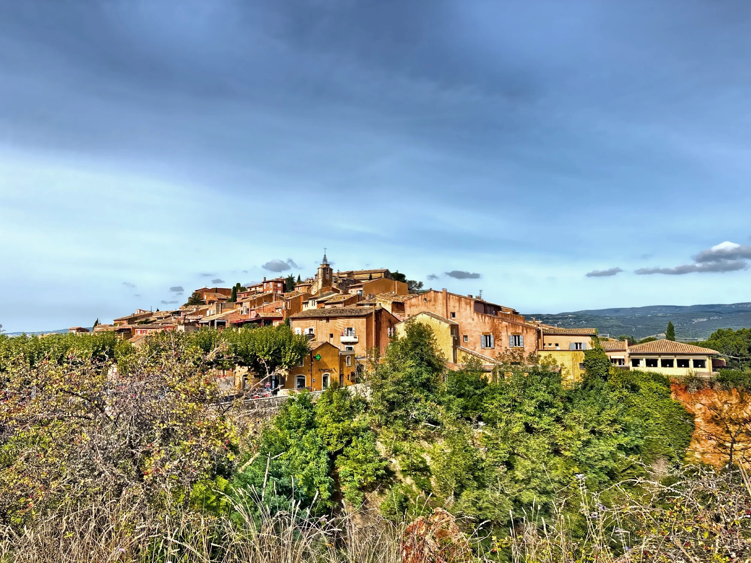 Today, that elevated perch rewards visitors with sweeping views of the Luberon’s rolling hills, vineyards, and forests. 