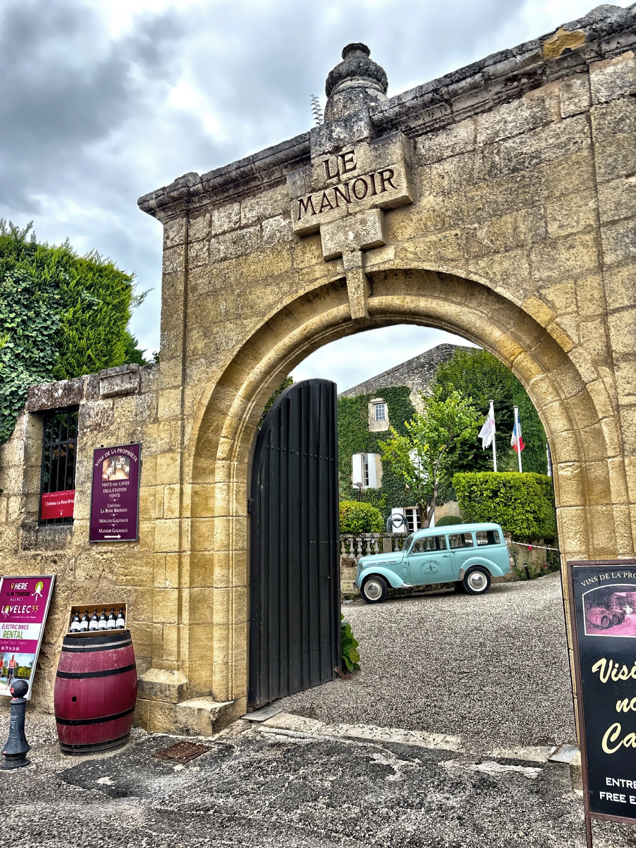  The entrance to Caves du Manoir, a historic residence and winery built from the 12th century on old fortifications. 