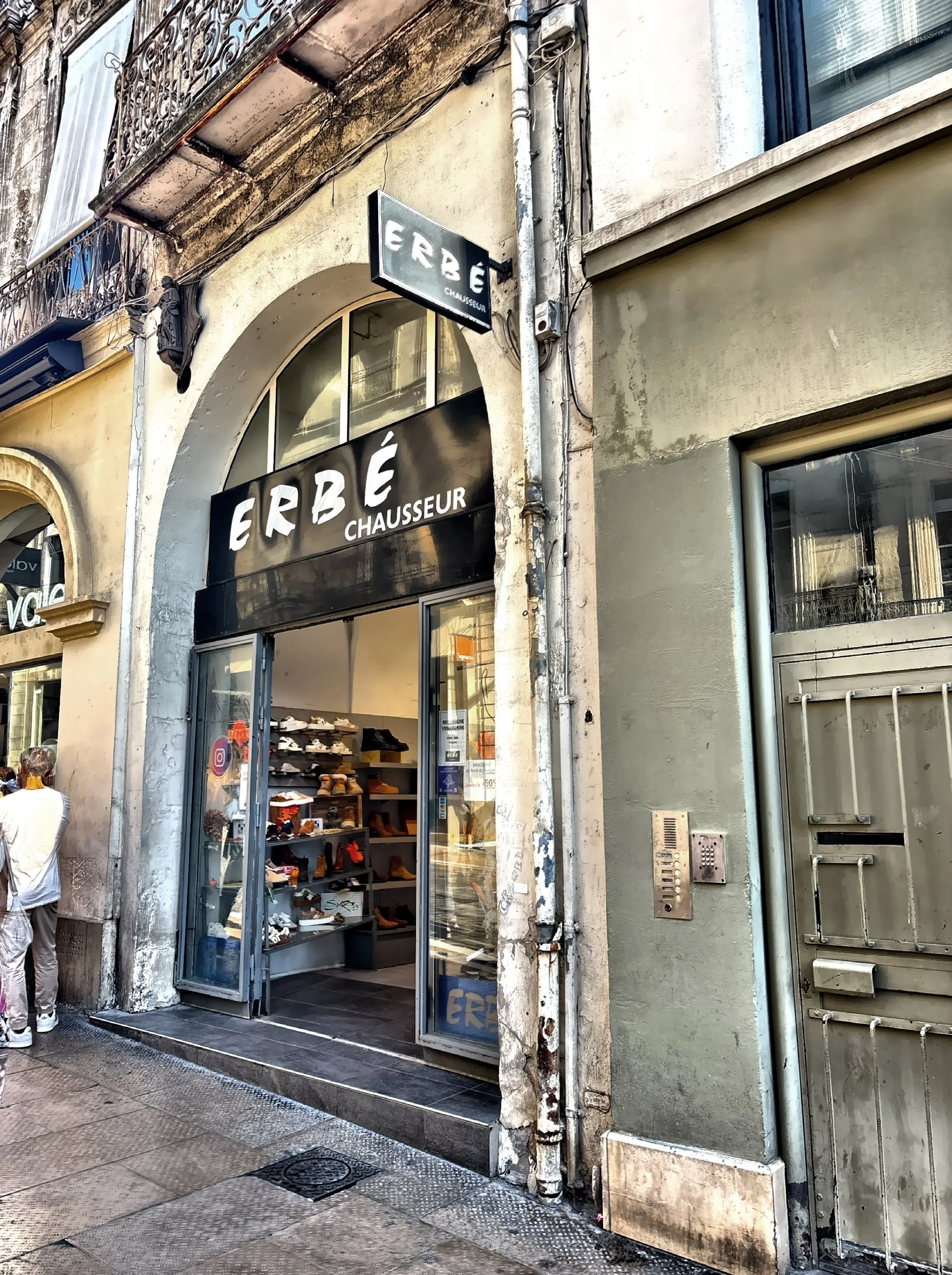  Erbe Chaussures is considered by some as more than just a shoe store.  It is said that behind the store lies an old well associated with Saint Roch.  Notice the statue of Saint Roch up high to the left of the entrance. 