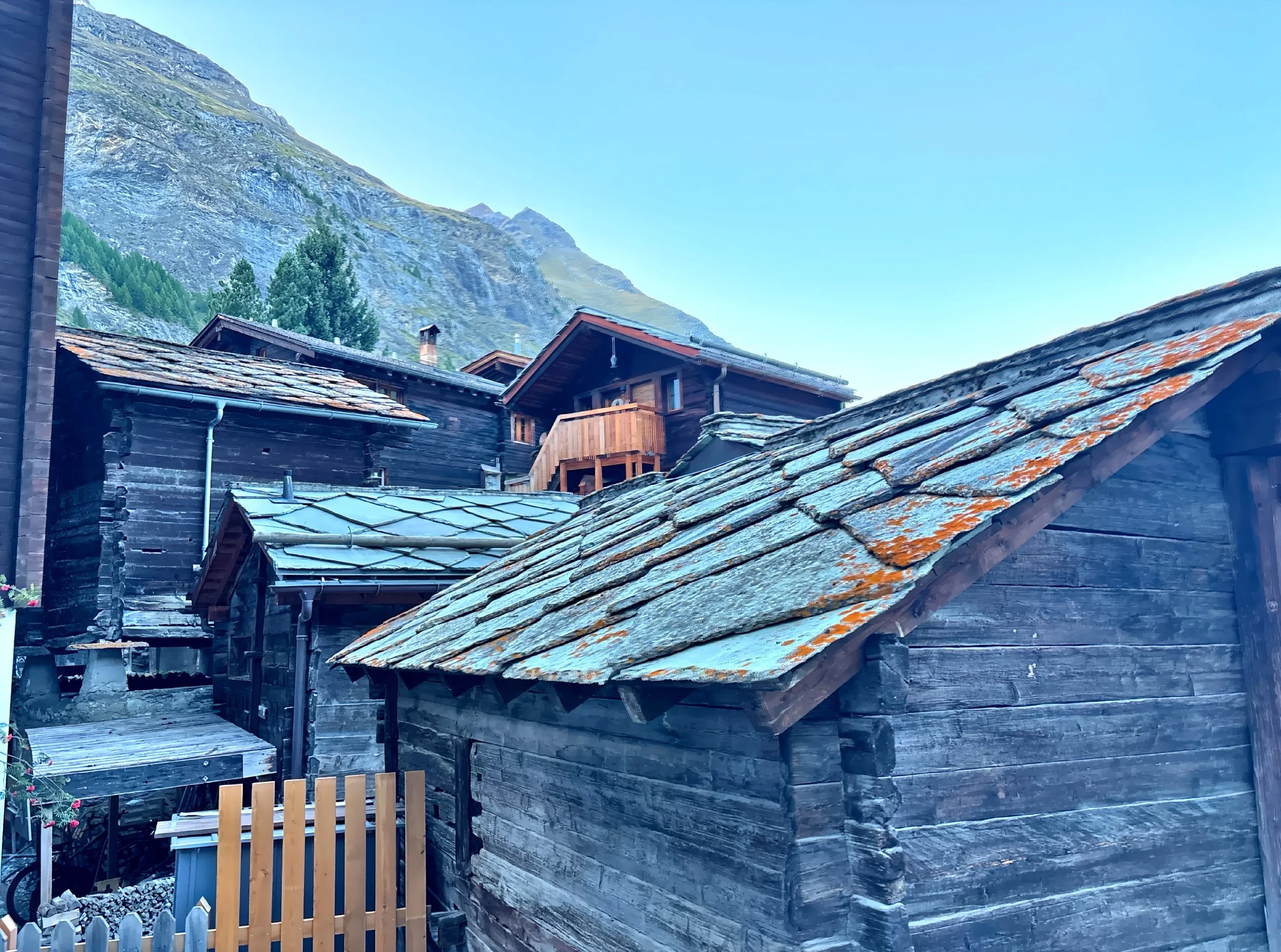  This shows Zermatt’s traditional roofs made of heavy, locally sourced stone slabs of schist and slate.  These roofs were built to last.  