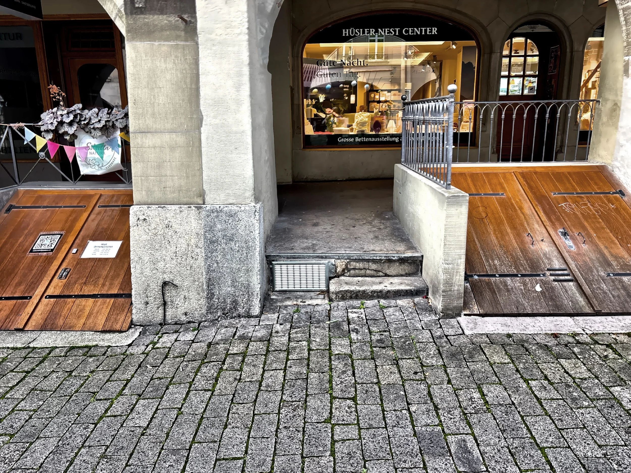  Entrances to some of the subterranean businesses including stores, restaurants and clubs.  