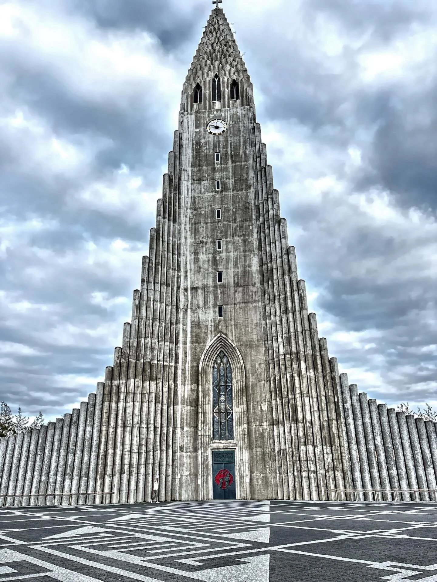 Hallgr&iacute;mskirkja, an iconic Lutheran parish church and national sanctuary located in Reykjav&iacute;k, Iceland. The church&rsquo;s striking modernist design was inspired by Iceland&rsquo;s natural landscape, particularly the columnar basalt for