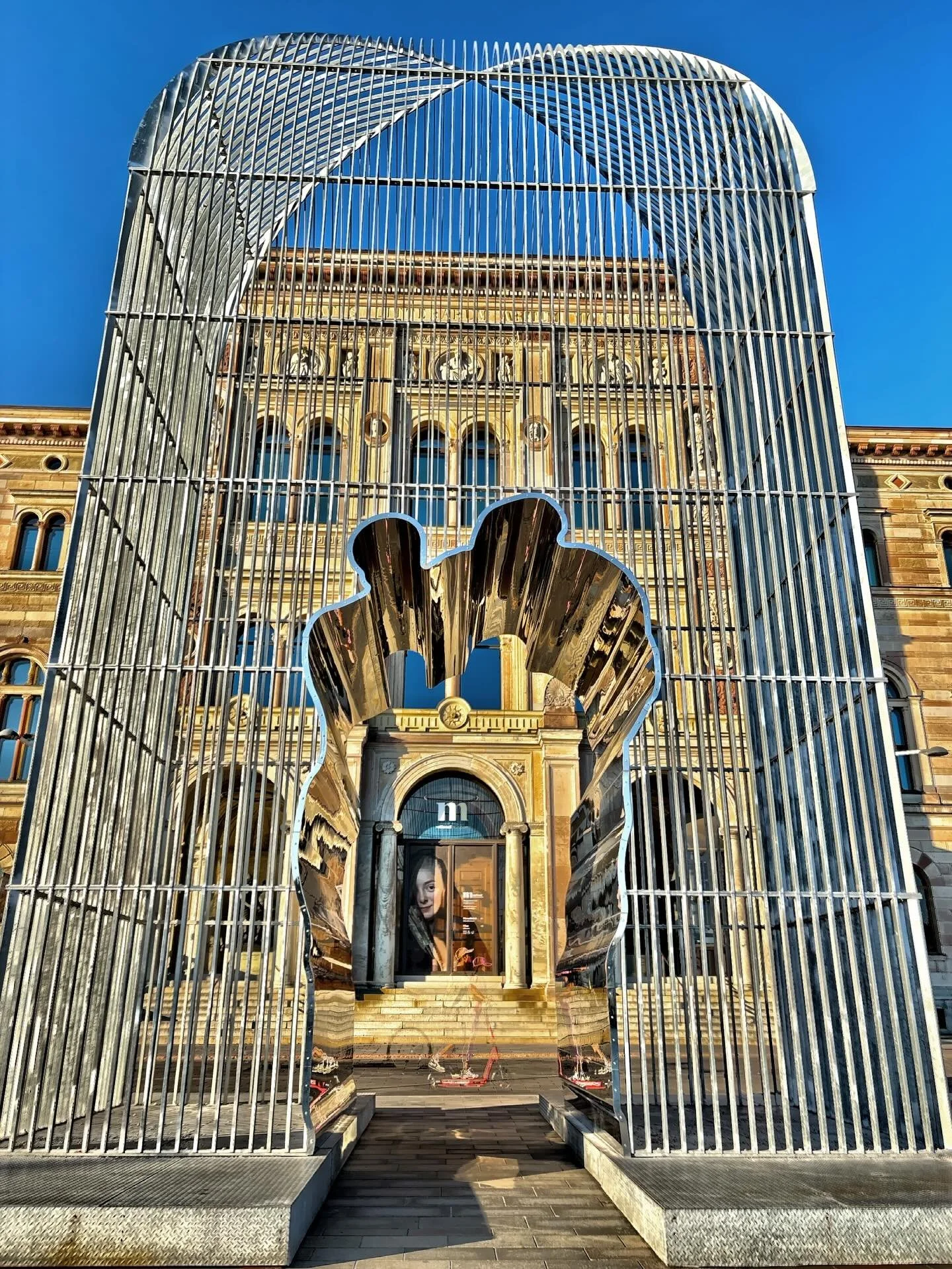 Ai Weiwei&rsquo;s sculpture Arch installed outside the Nationalmuseum in Stockholm. The sculpture is a monumental, 40-foot-tall cage-like structure made of polished stainless steel. It was first shown in Washington Square Park, New York, in 2017. 
Th