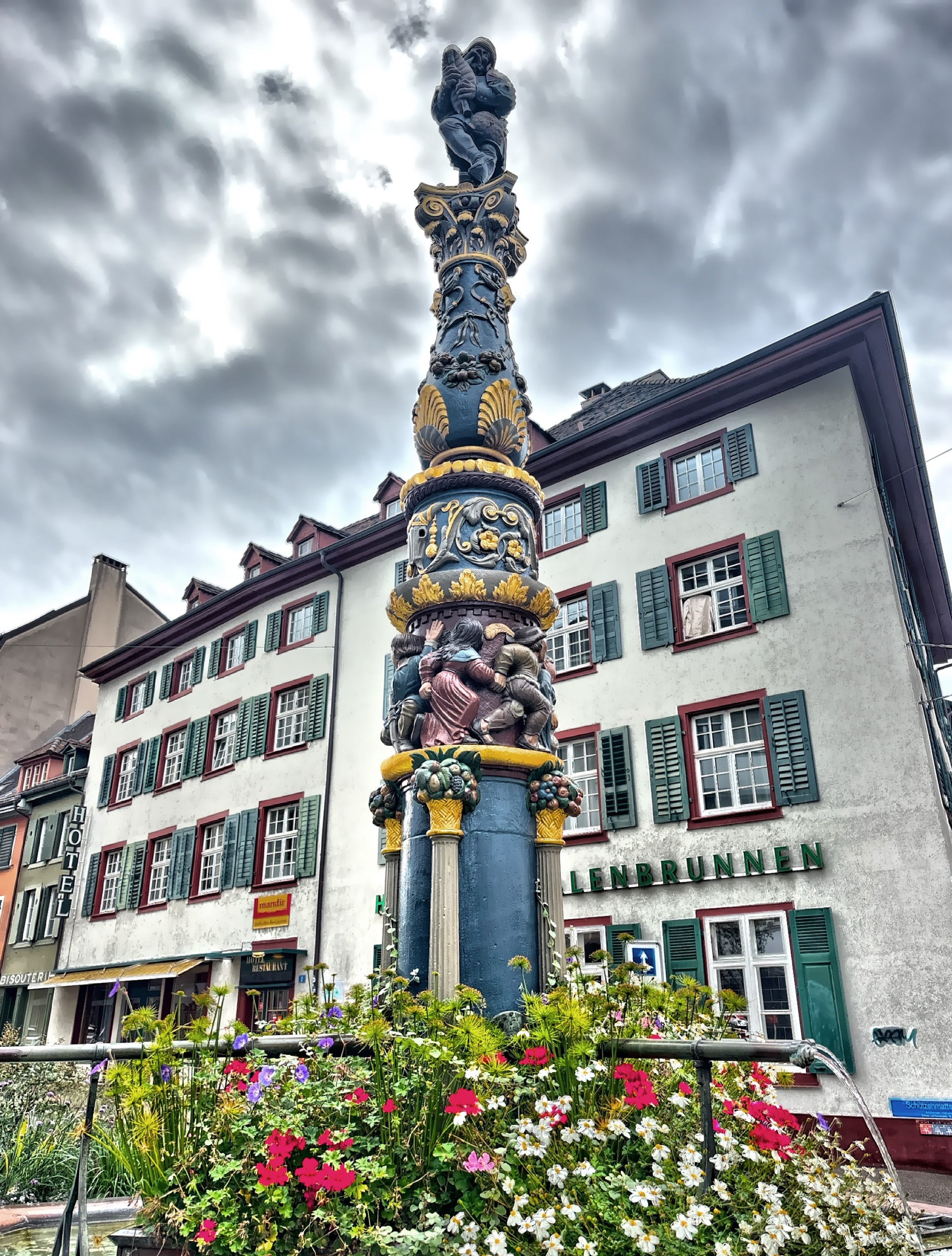  The Holbein Fountain, featuring a figure of a bagpiper at the top, was erected in the mid-1500’s. 