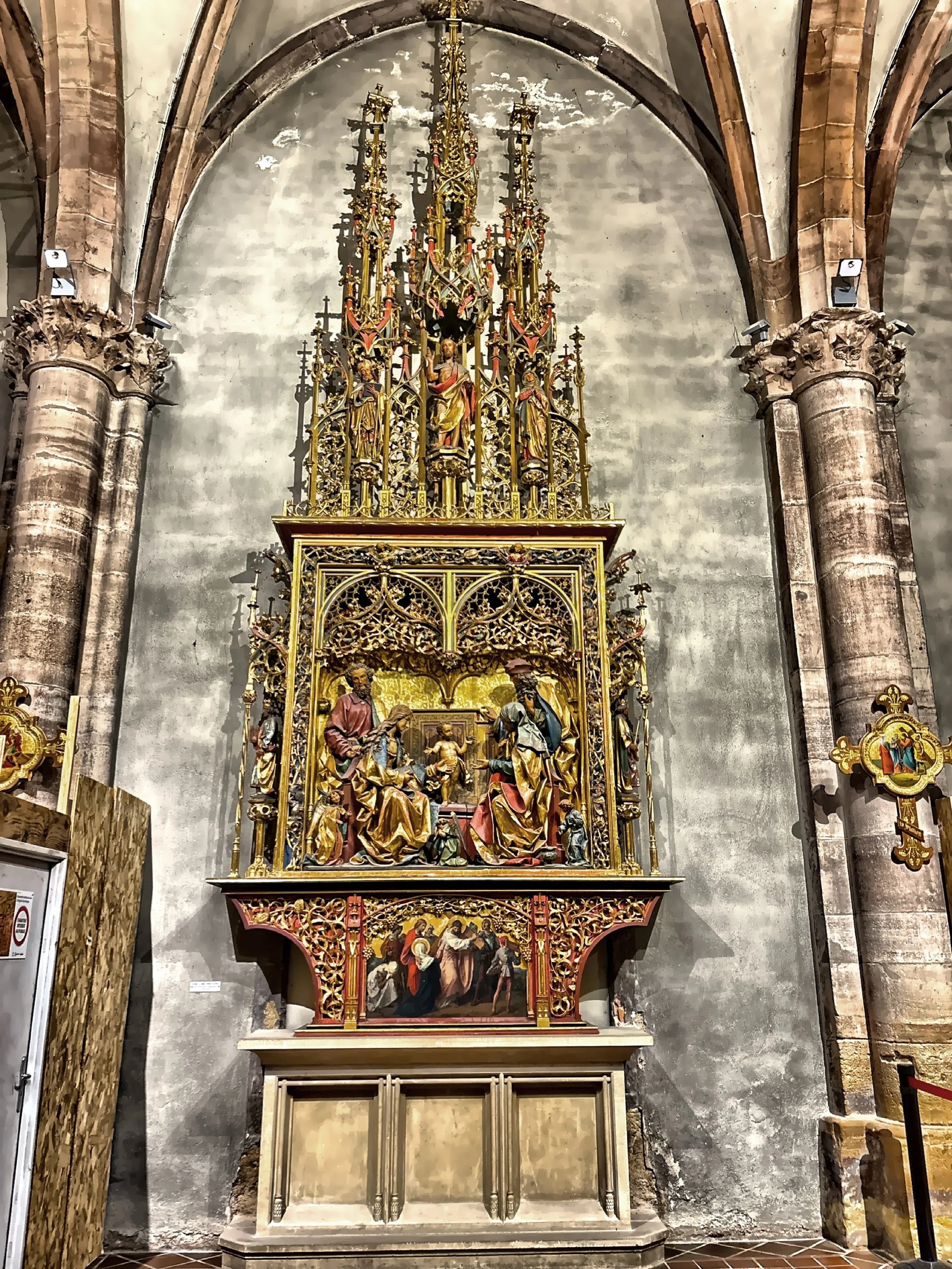  The Gothic revival altarpiece of the Holy Kinship of Jesus. 