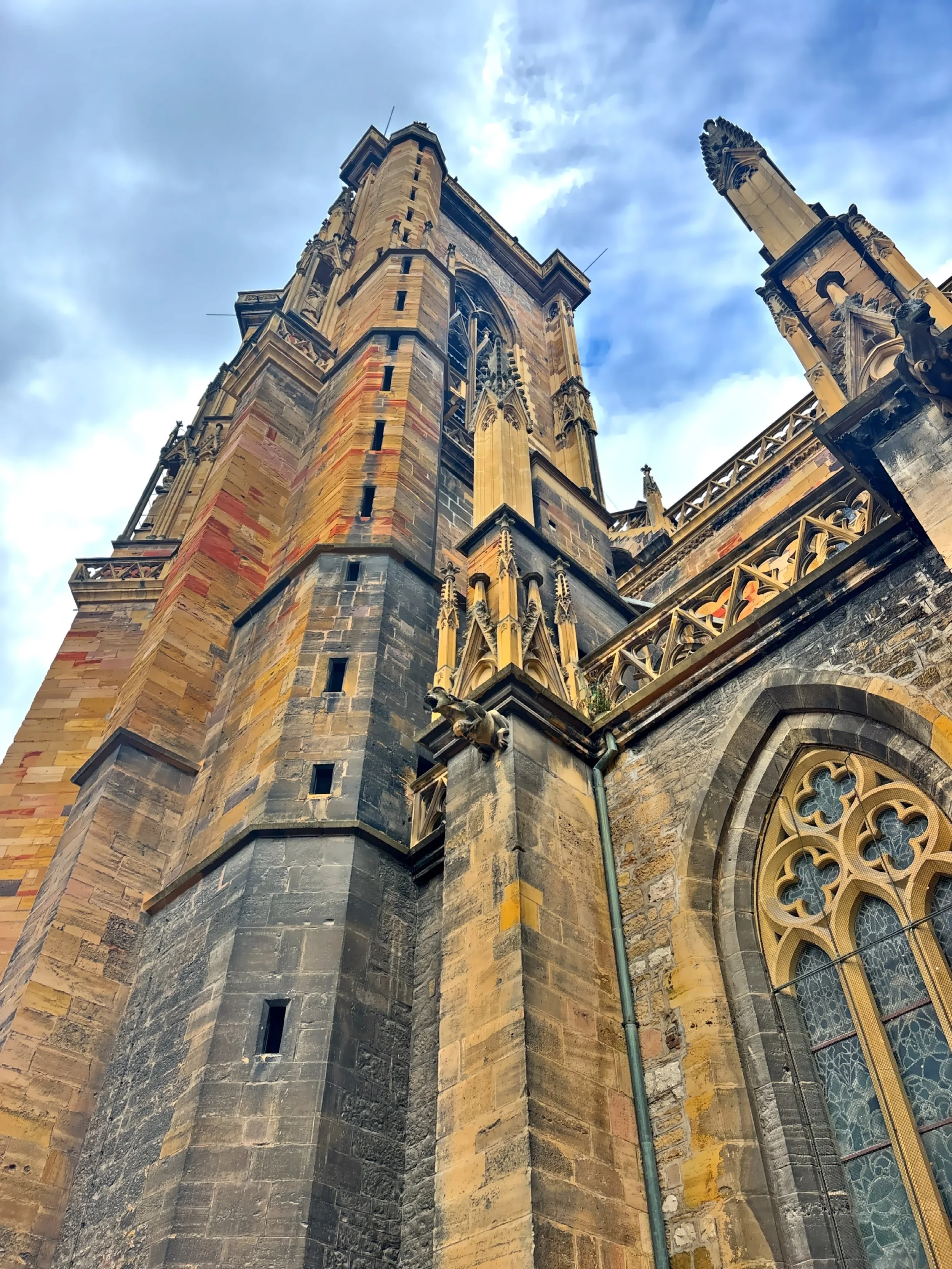  The church stands watch over Colmar’s colorful streets, a timeless Gothic presence in the heart of Alsace. 