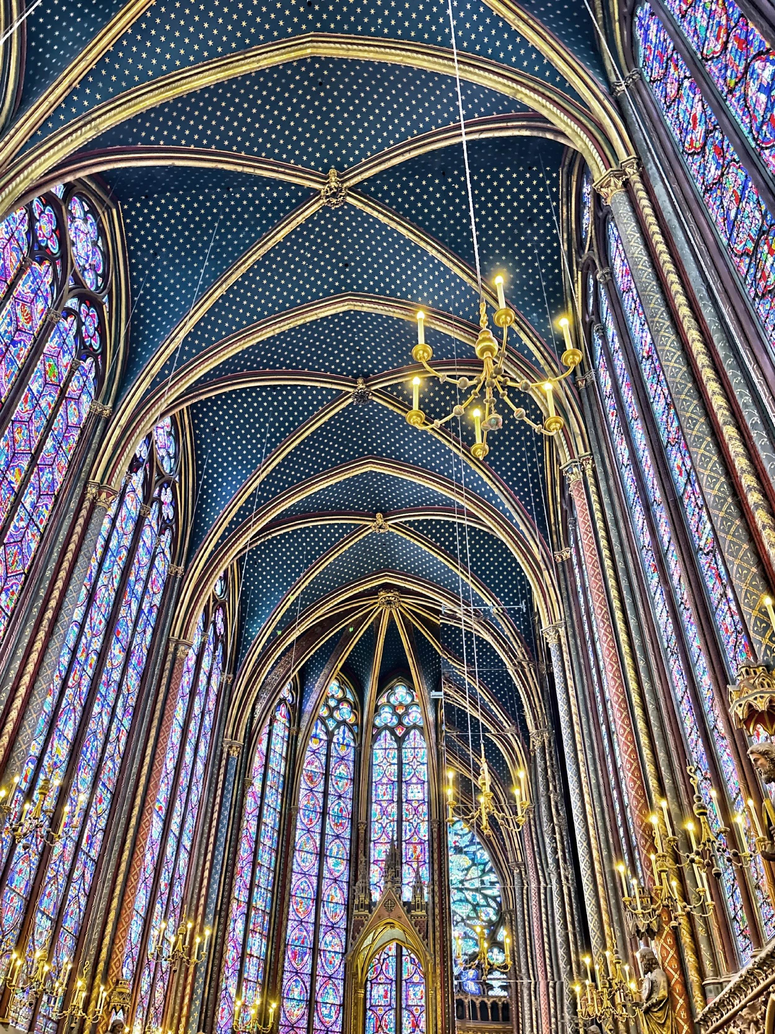  The upper chapel is renowned for its stunning walls of stained glass. 